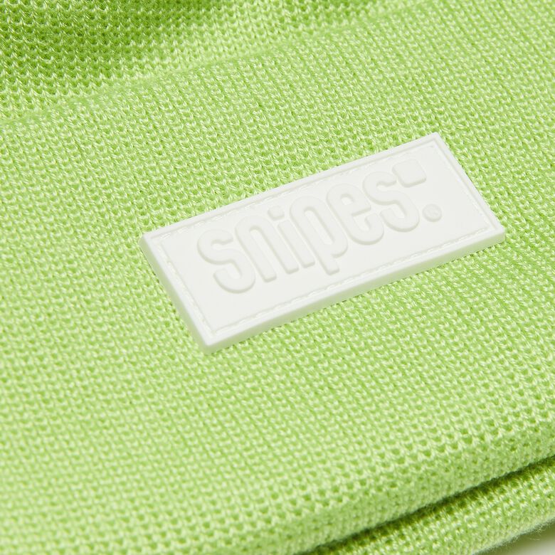 Muts met geweven label