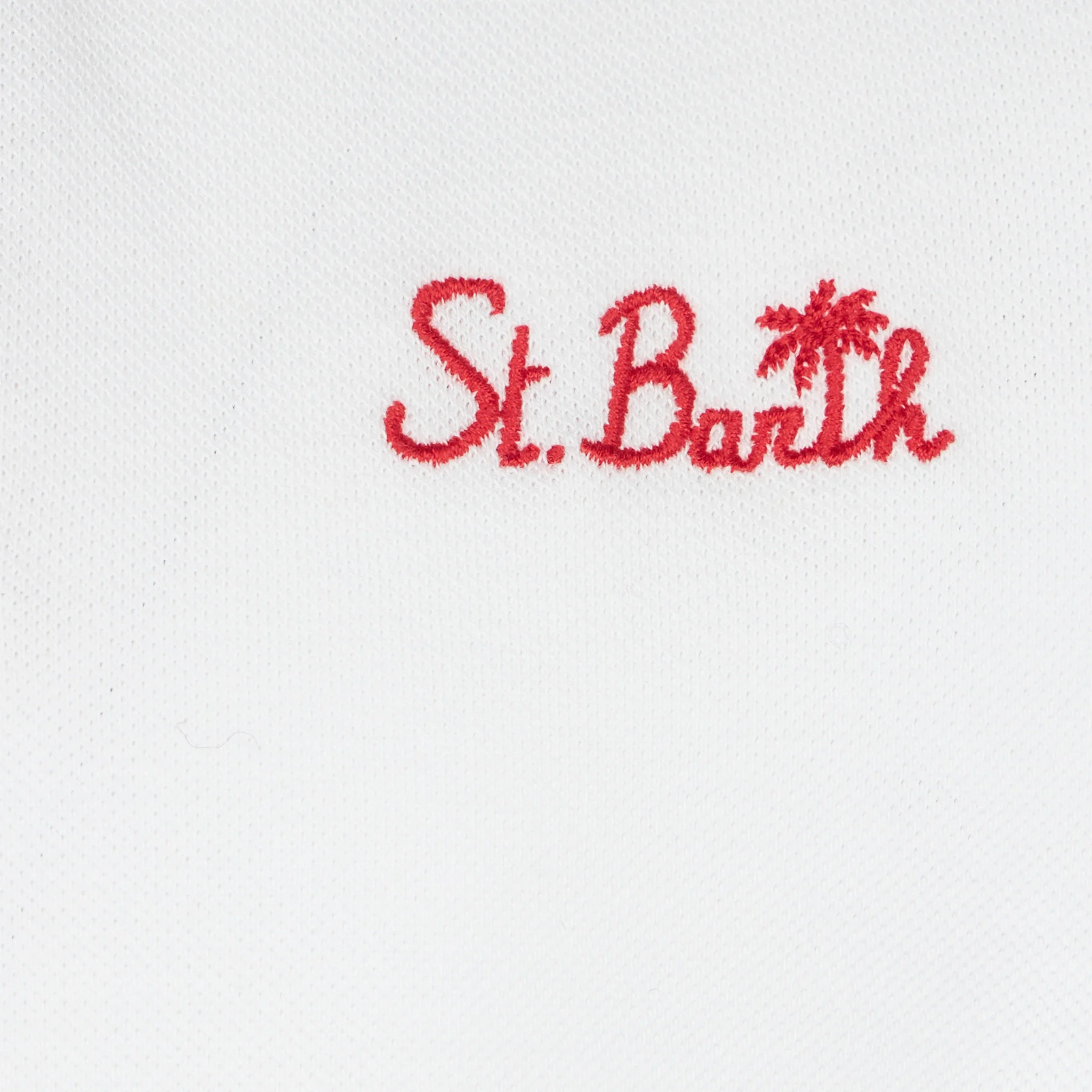 Polo blanco de piqué para niños con bordado