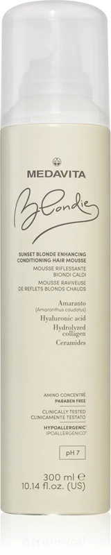 „Medavita Blondie Sunset Blonde Enhancing Conditioner Hair Mouse“ – tai putojantis kondicionierius, skirtas šiltiems blondinų atspalviams.