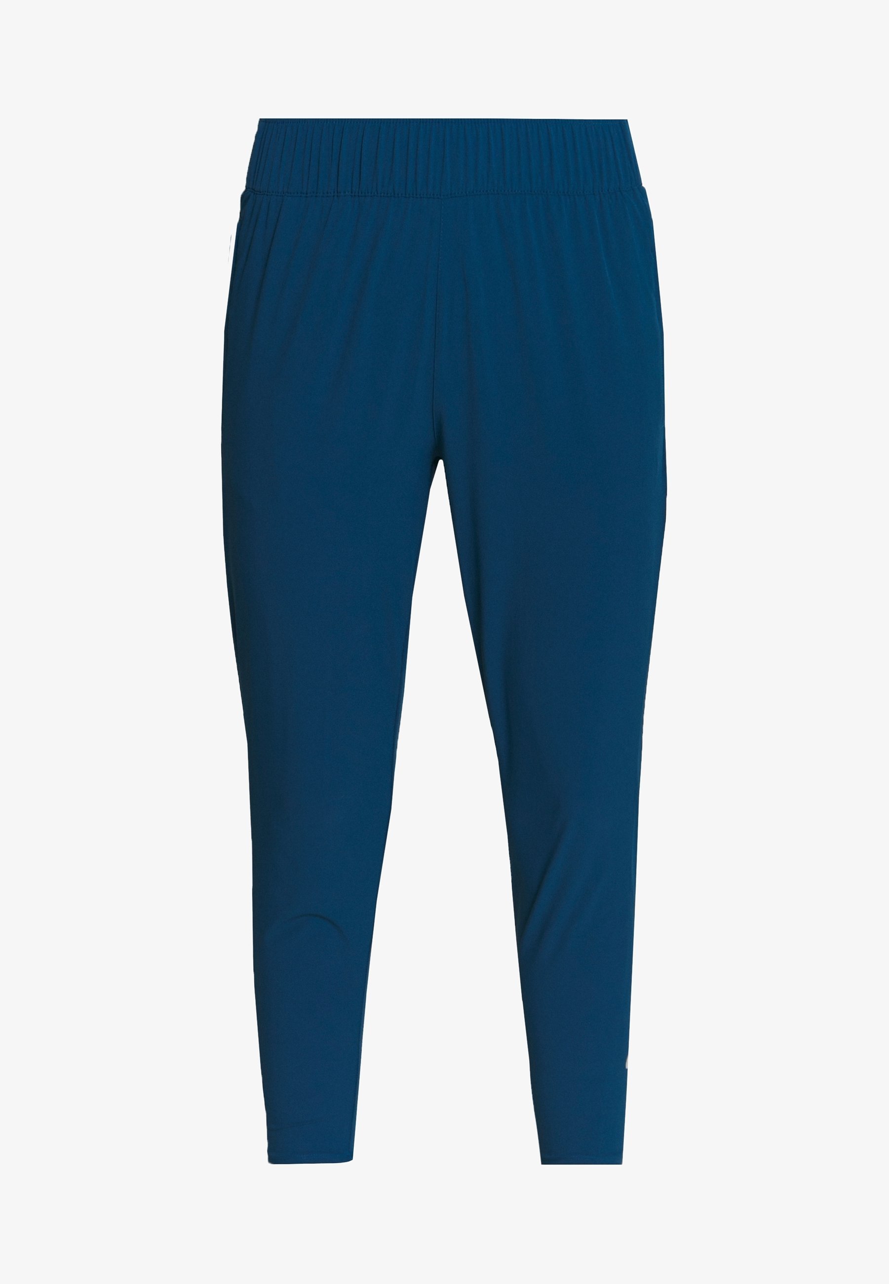 Spodnie dresowe Nike Performance - niebieskie