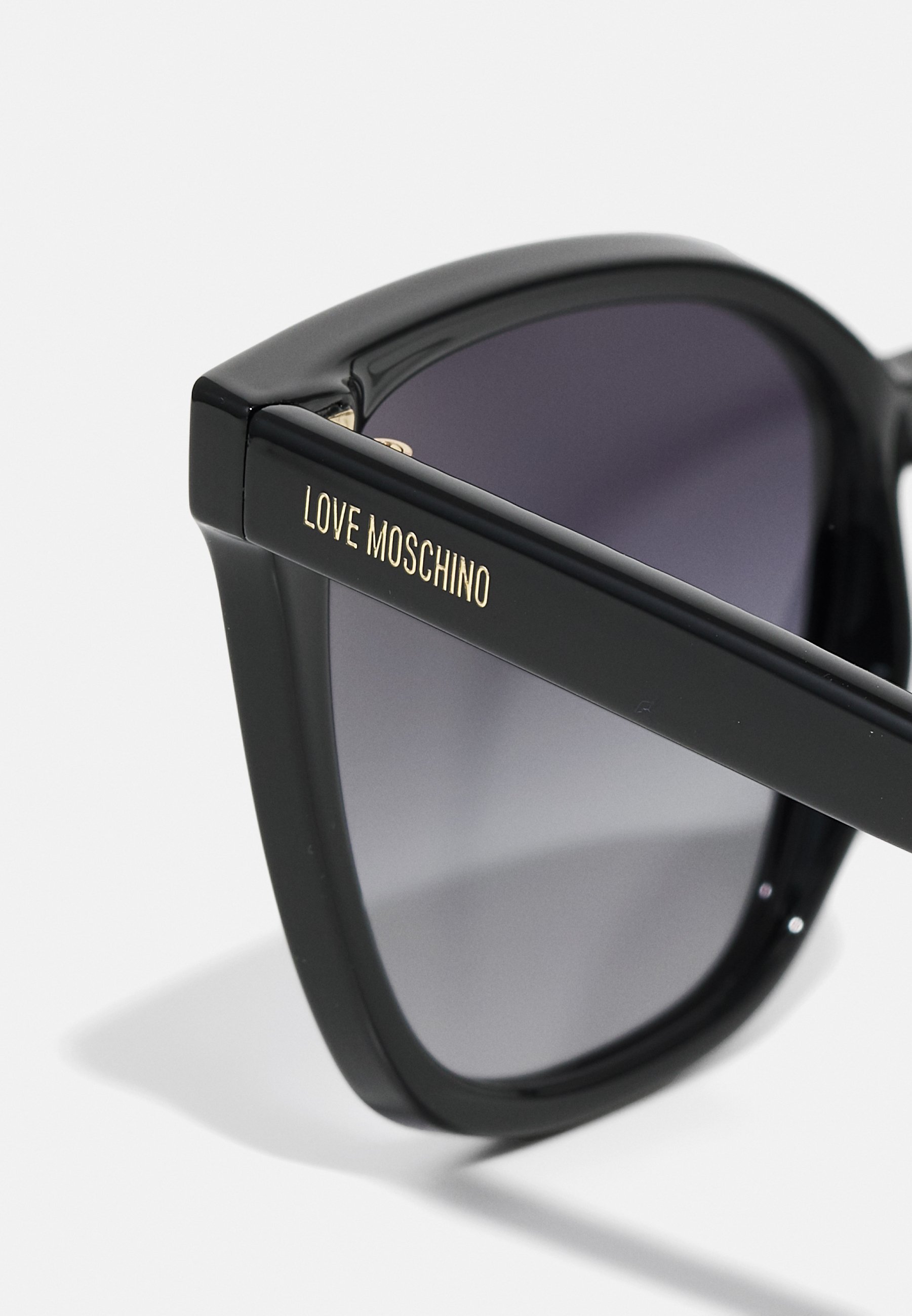 Lunettes de soleil Love Moschino - noires