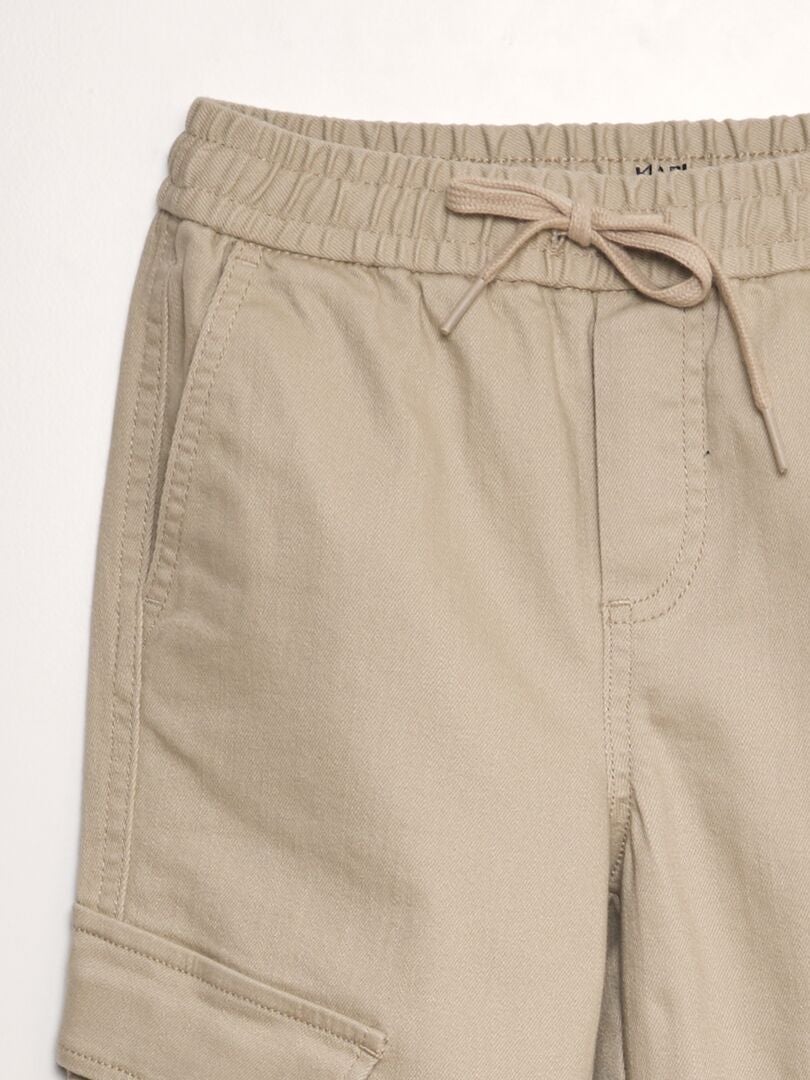 Fleecejoggingbyxor med sidofickor - BEIGE