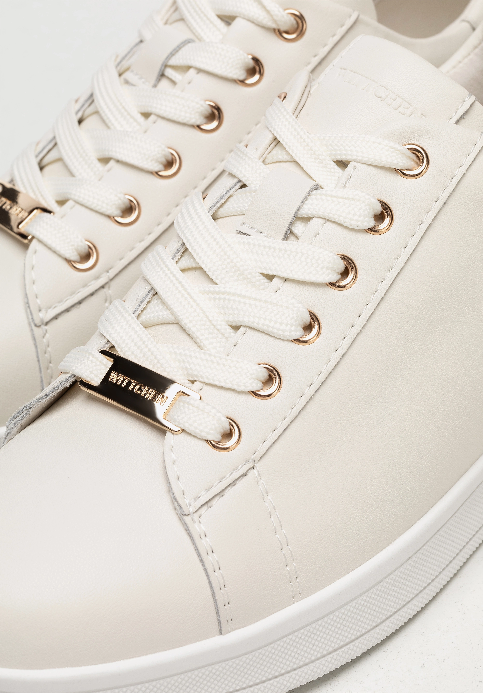 Damskie sneakersy skórzane na platformie kremowe
