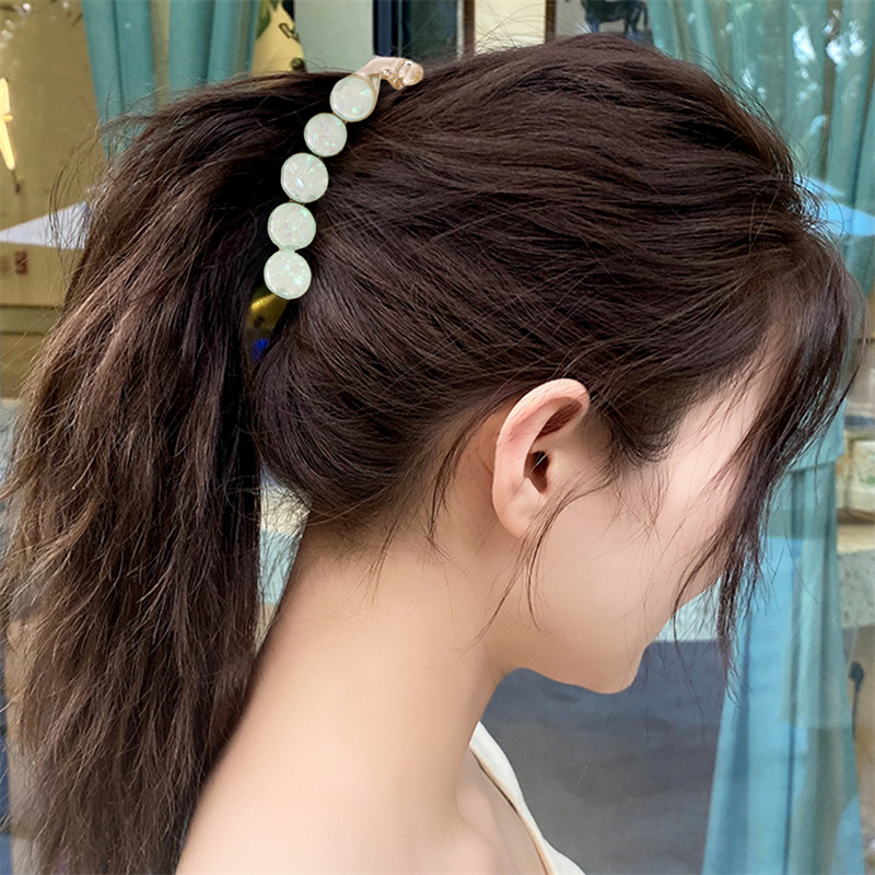 Chris Rubin Lina Pince Cheveux