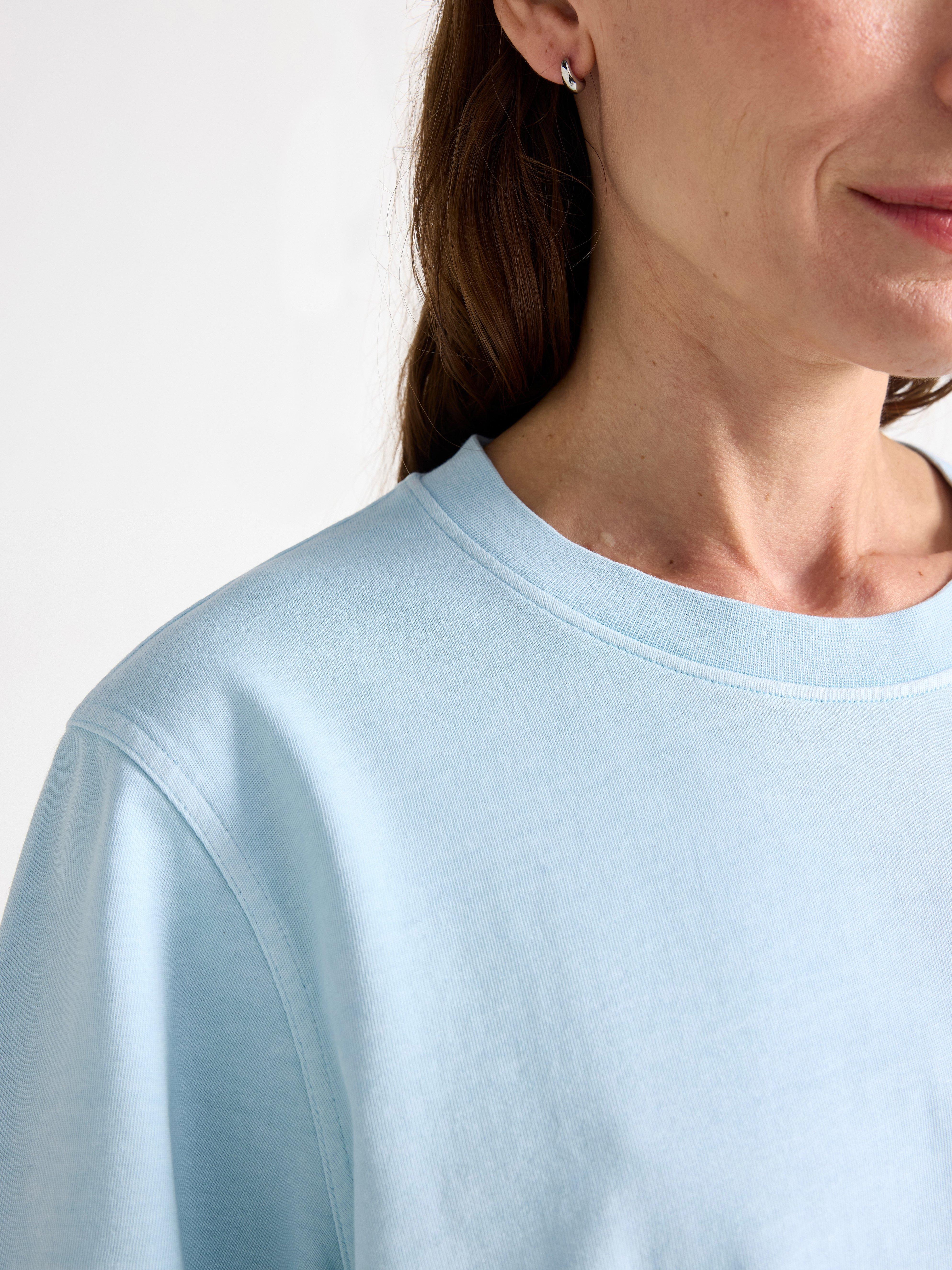Camiseta oversized azul claro