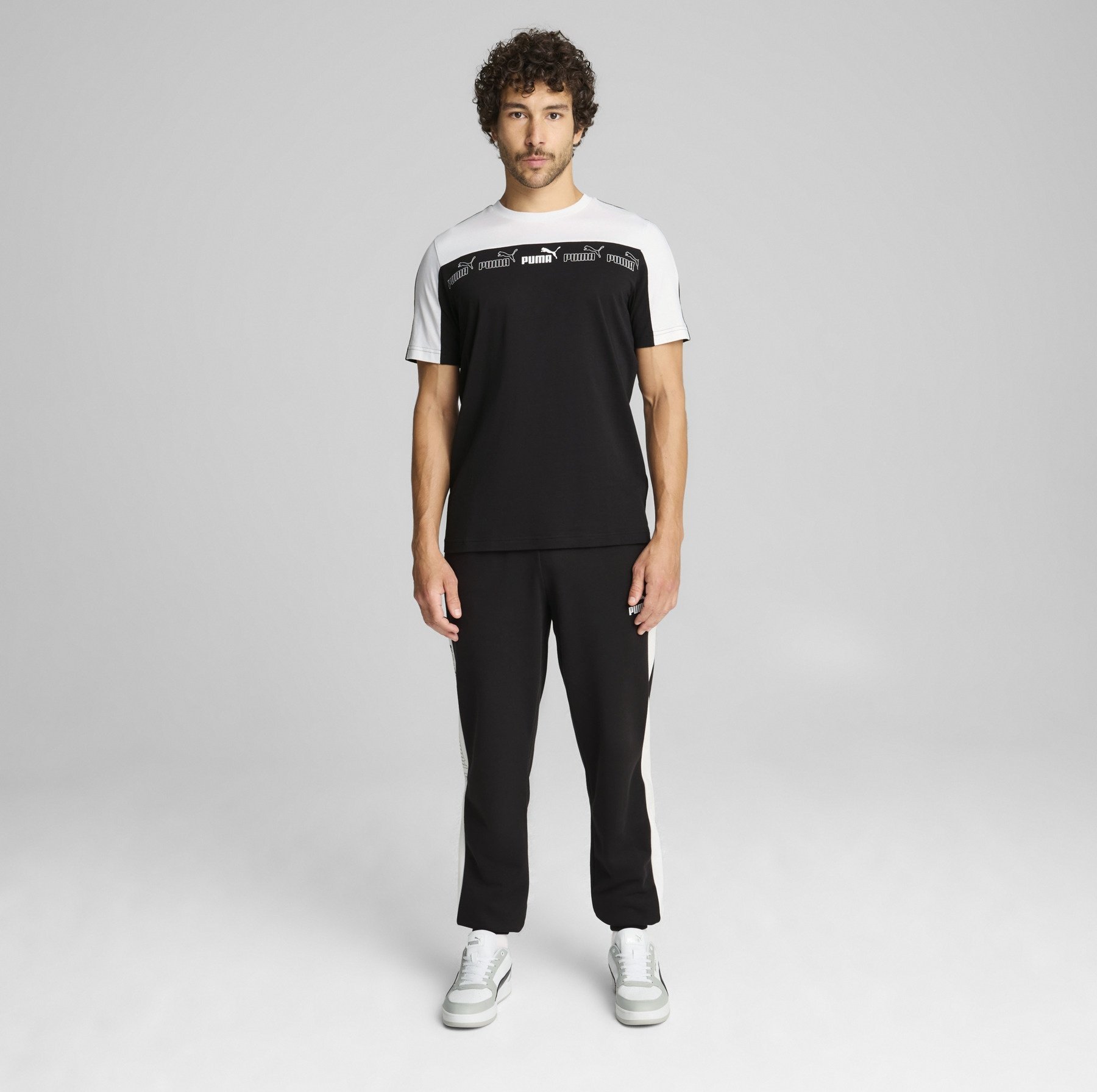 Pantaloni della tuta Puma AROUND THE BLOCK - neri