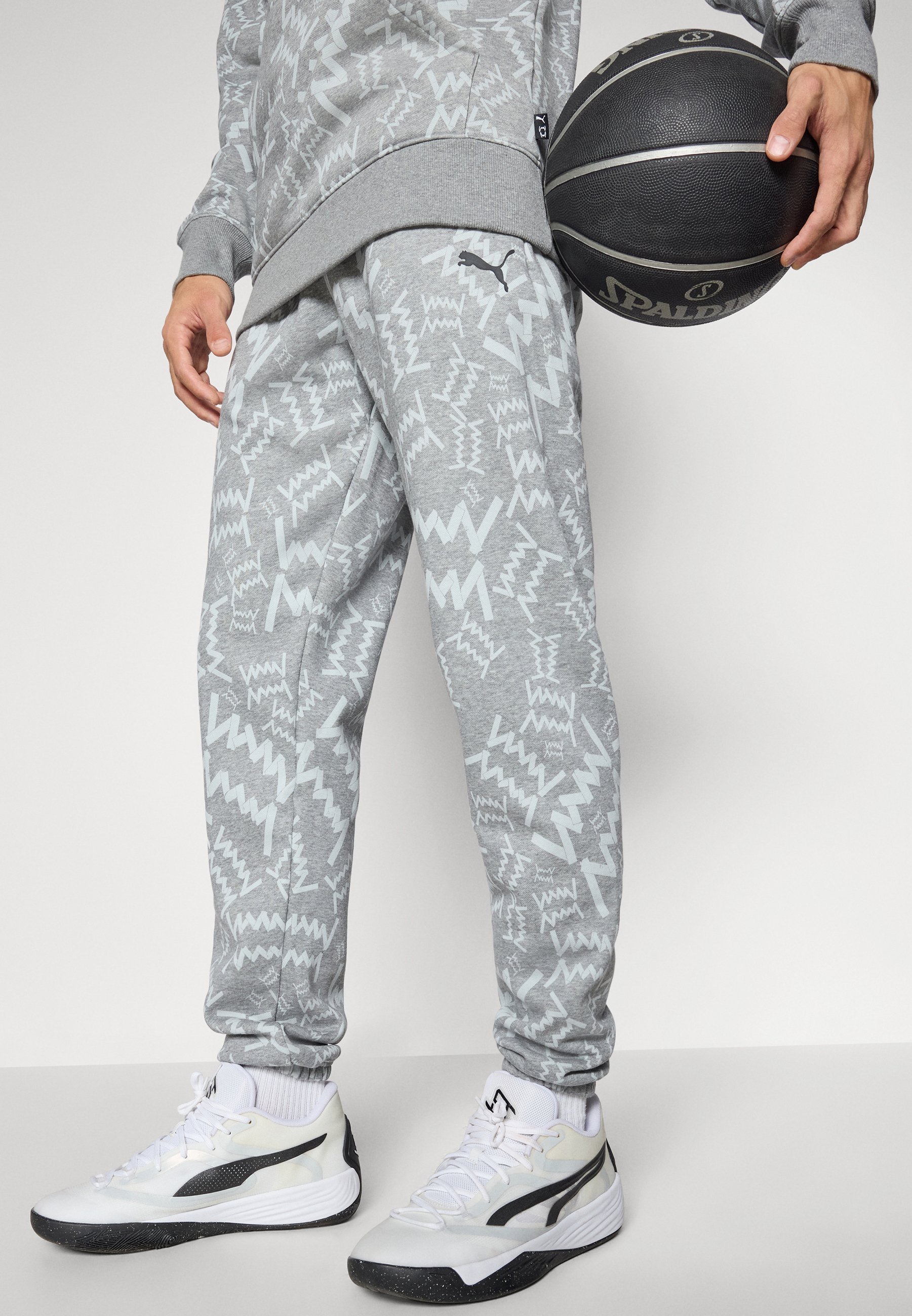 Puma TEAMJAWS POST GAME PANTS - Teplákové kalhoty - black