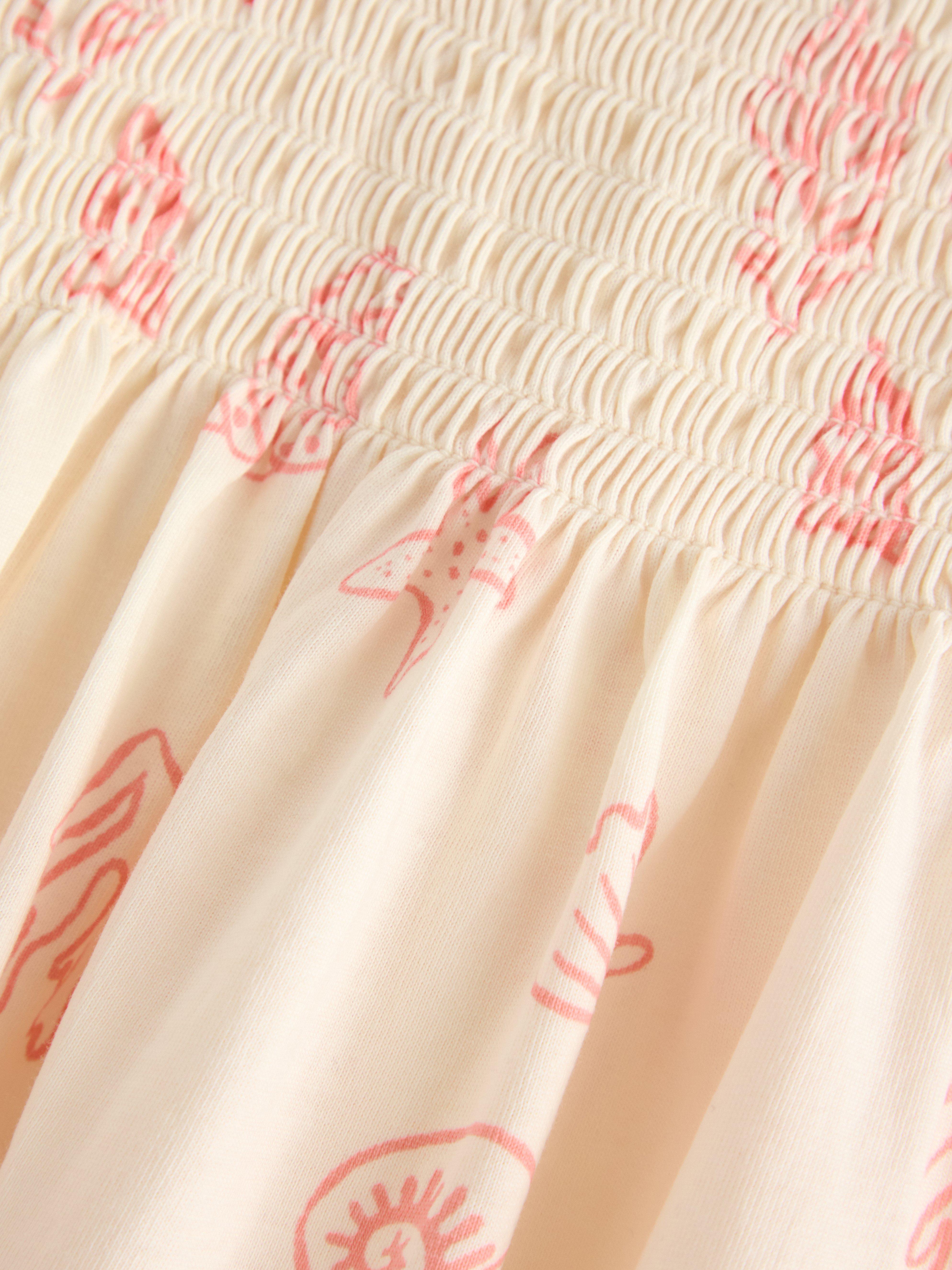 Robe blanche sans manches