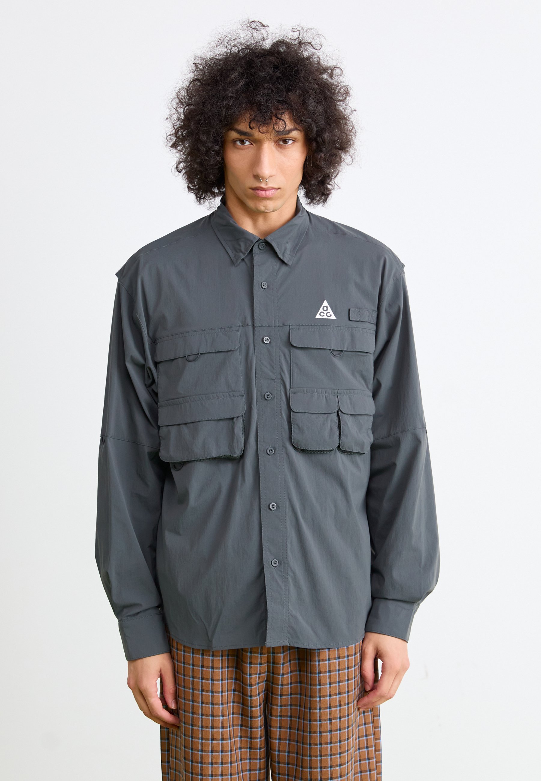 Přechodné bundy Nike ACG