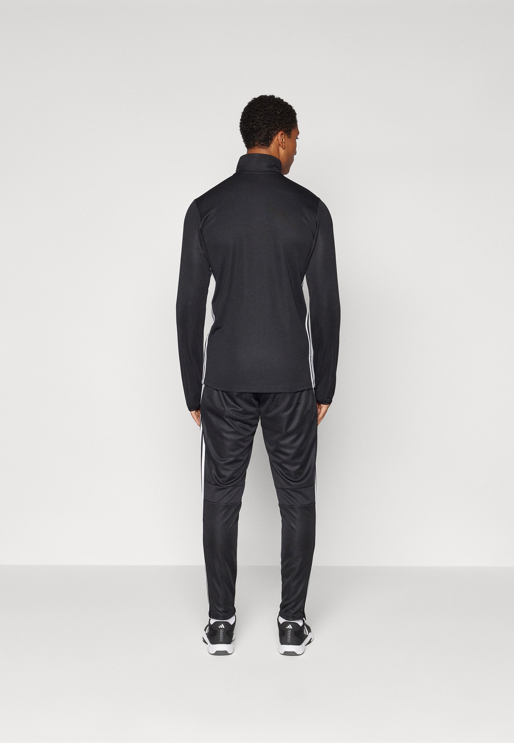 adidas Performance TIRO 25 ESSENTIALS - Bas de survêtement - Noir/Blanc