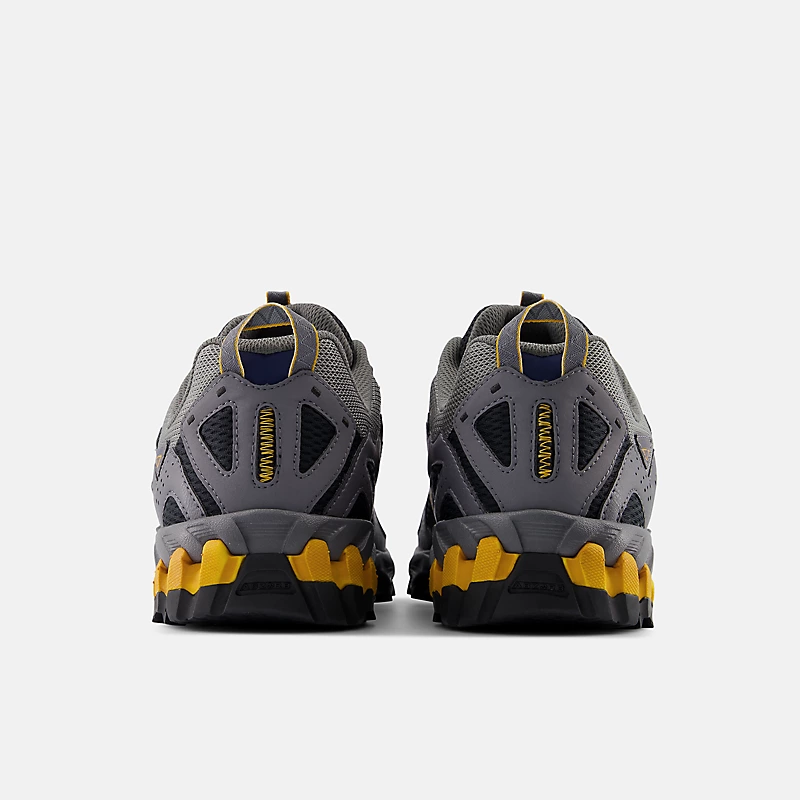 Unisex New Balance 610v1 - Castlerock z Varsity Gold i Phantom