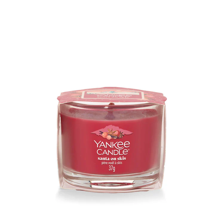 Filled Votive Candles Santa On Skis - Candela Profumata