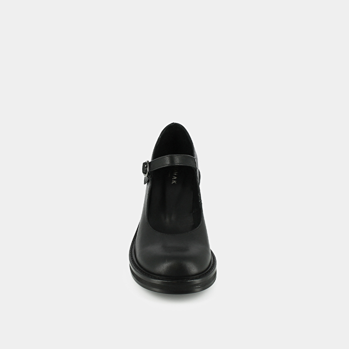 Babies à talons et semelles épaisses  en cuir noir