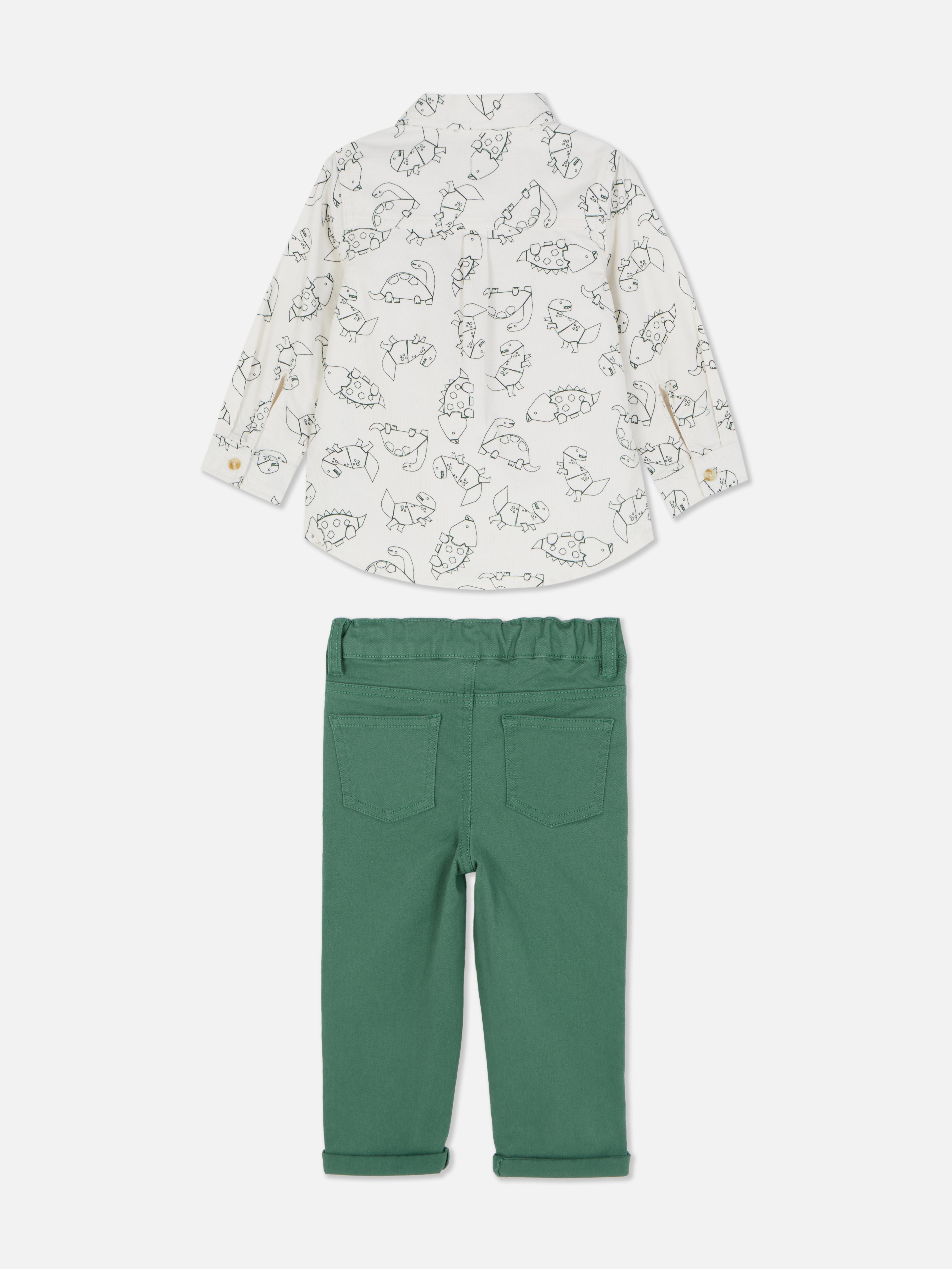 Set cămașă și pantaloni cu dinozaur. O cămașă și pantaloni cu mânecă lungă și manșete cu nervuri.