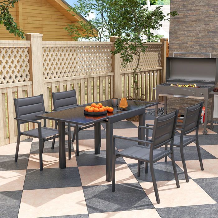 Conjunto de muebles de jardín Outsunny: mesa extensible con 4 sillas apilables, fabricado en aluminio y textilene, color gris oscuro.
