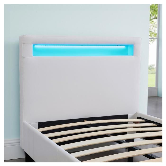 Cama individual LUCENO LED de 90x190 cm con somier de láminas, cabecero confortable y tapicería sintética blanca.