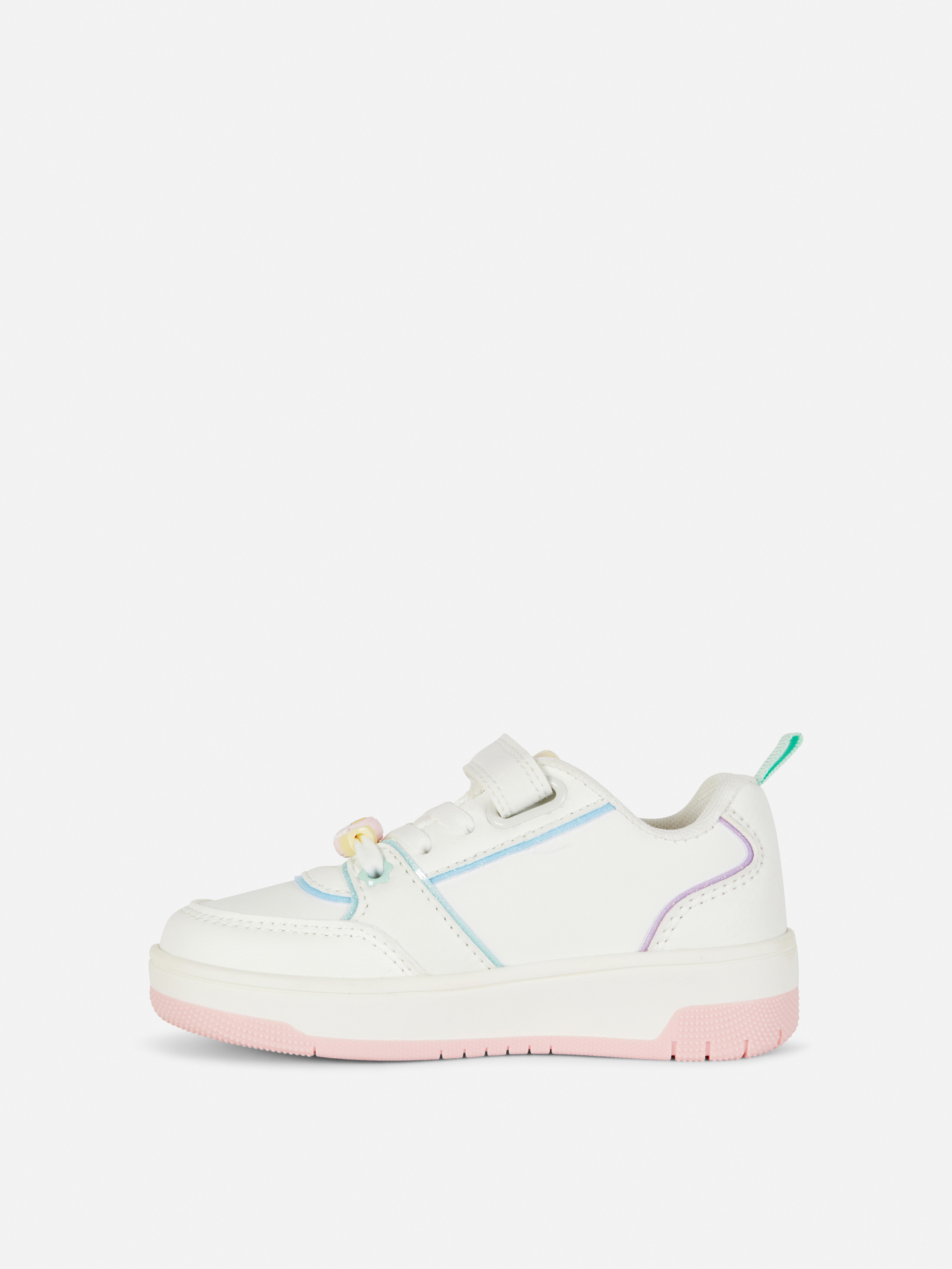 Sneakers basse in tela con stampa arcobaleno. Regala loro queste sneakers carine e comode con un arcobaleno stampato sopra.
