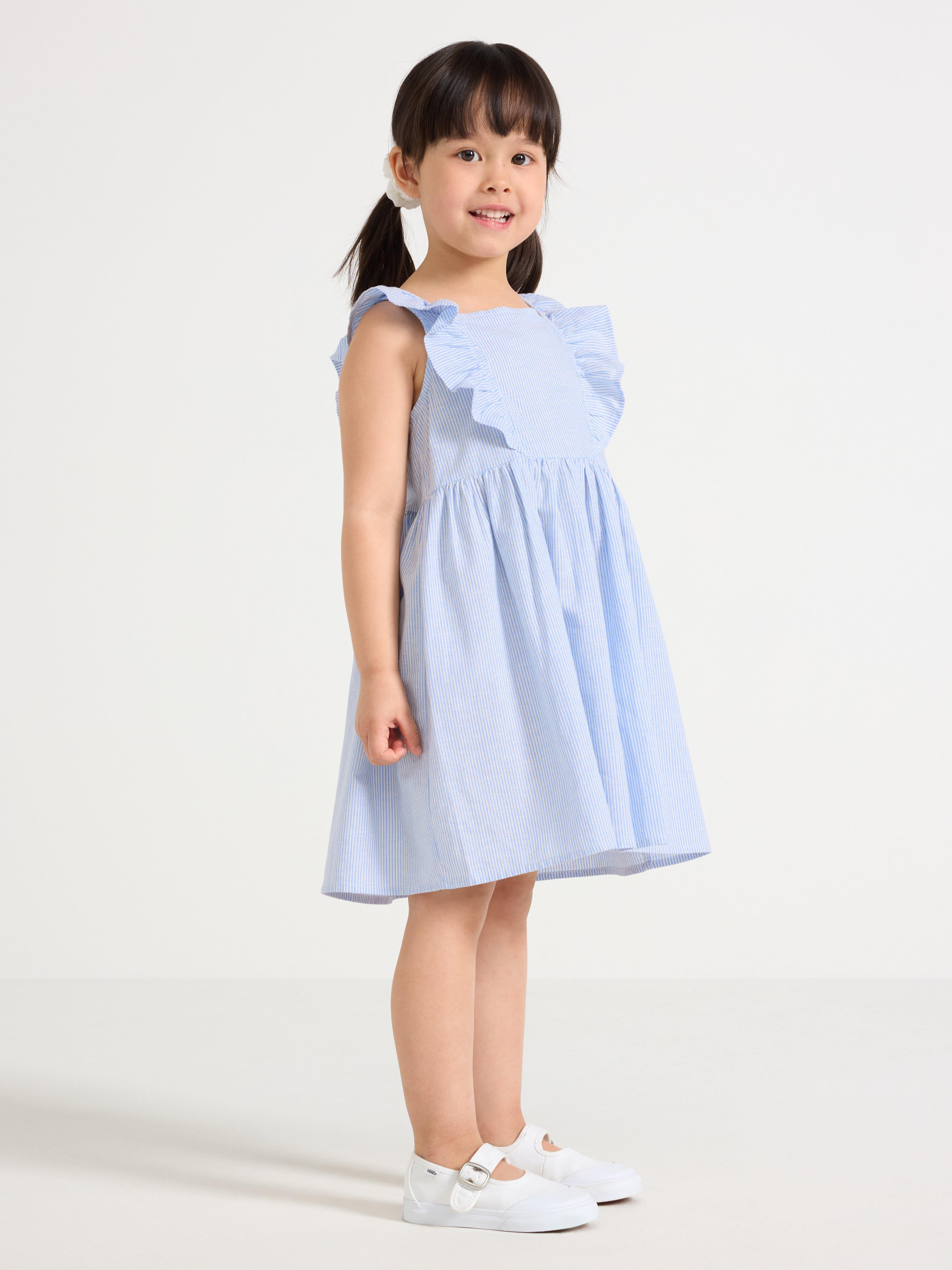 Vestido con volantes azul claro
