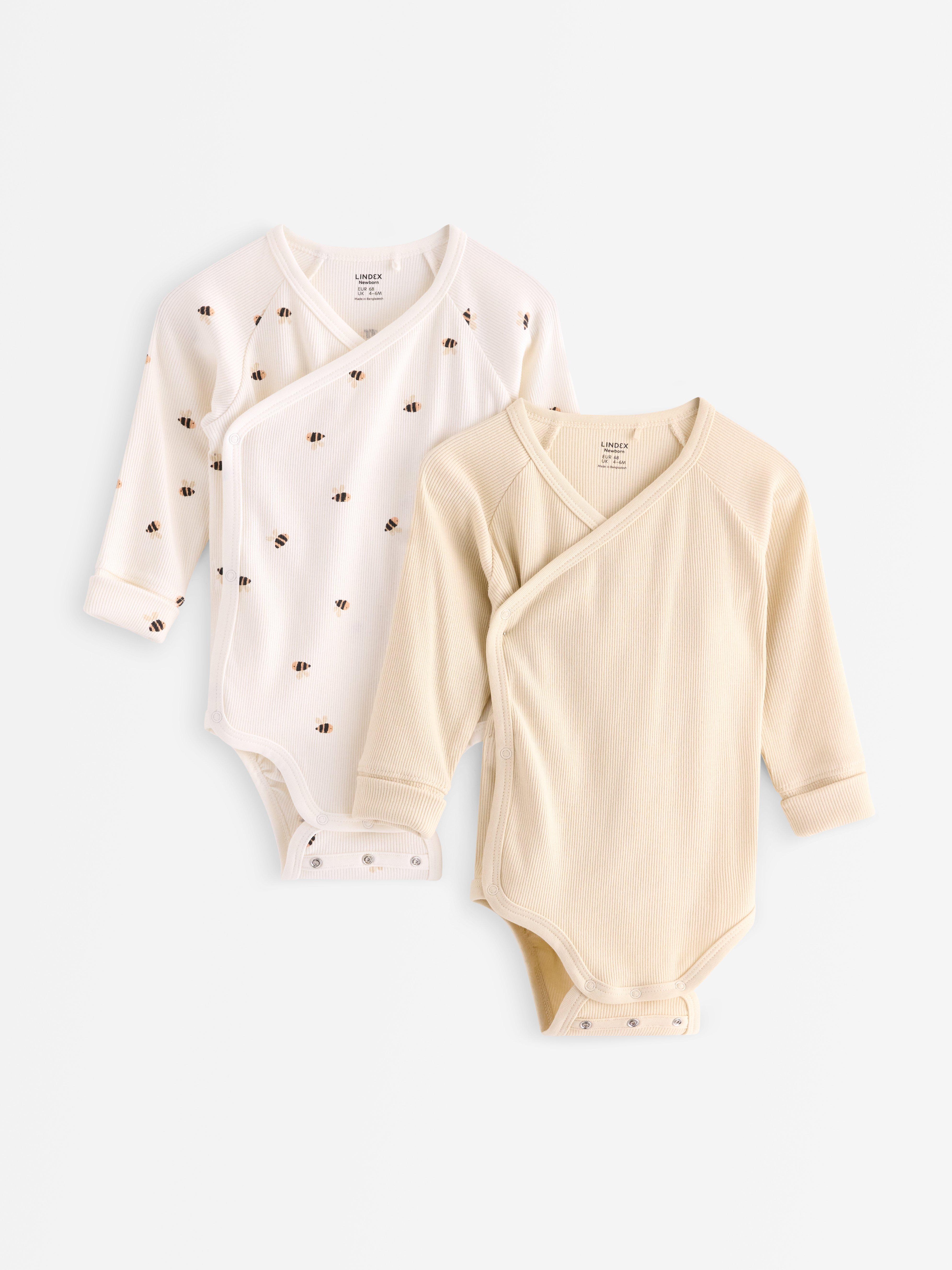Paquete de 2 bodys cruzados acanalados color beige claro