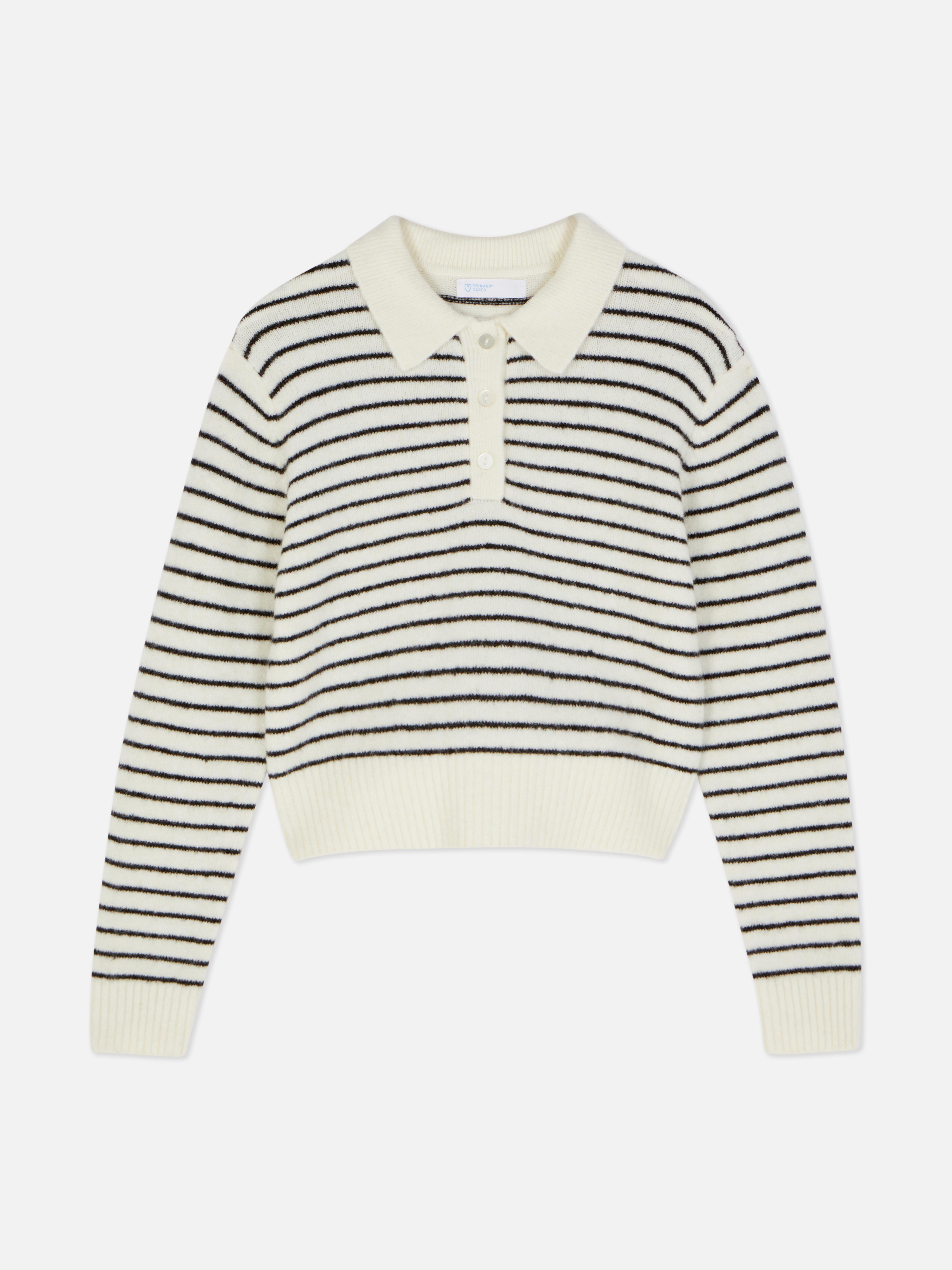 Genser med polokrage En myk genser med polokrage og knappestolpe for et komfortabelt, preppy utseende