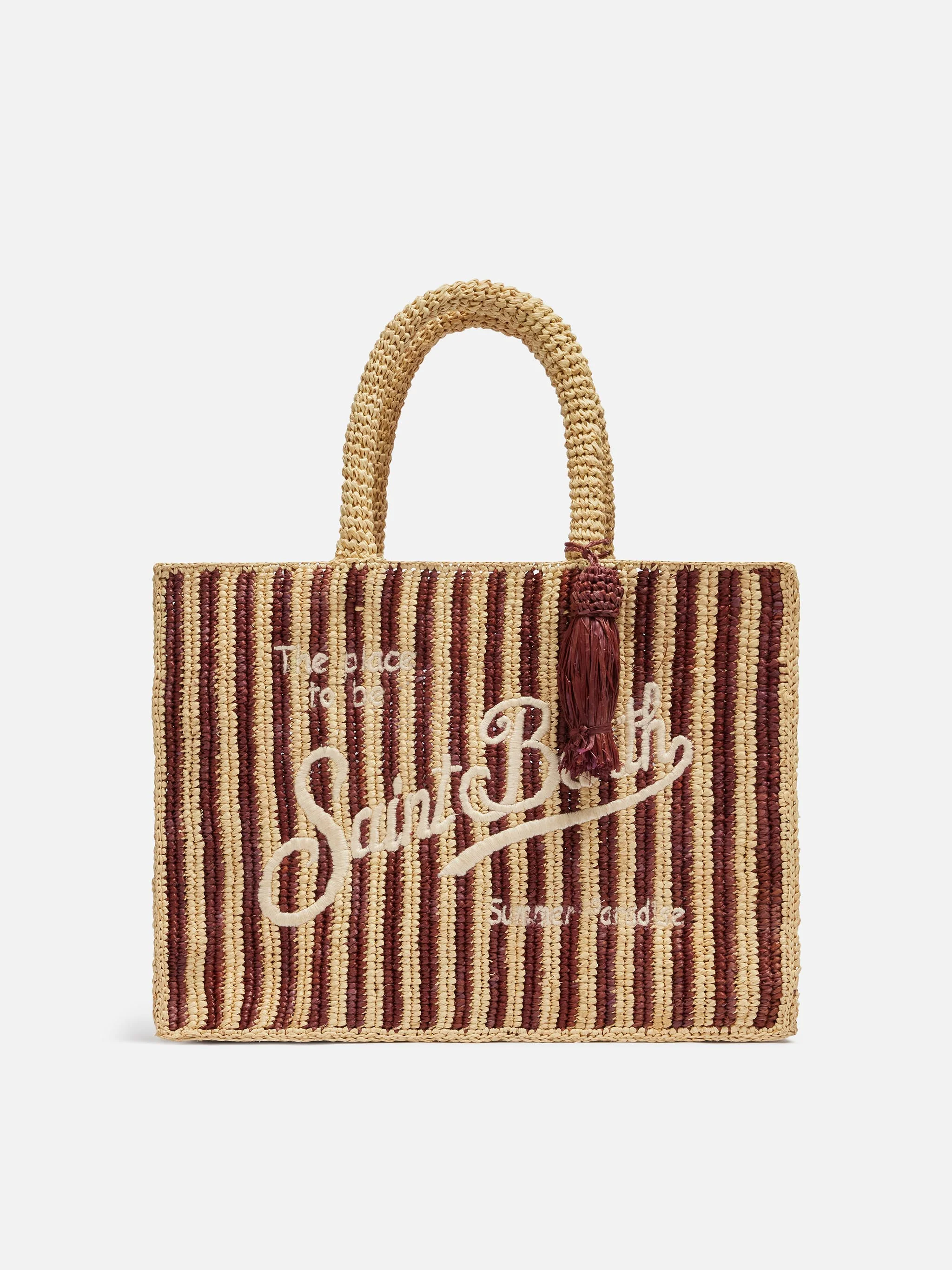 Colette tas van bruin gestreept raffia met geborduurd logo.
