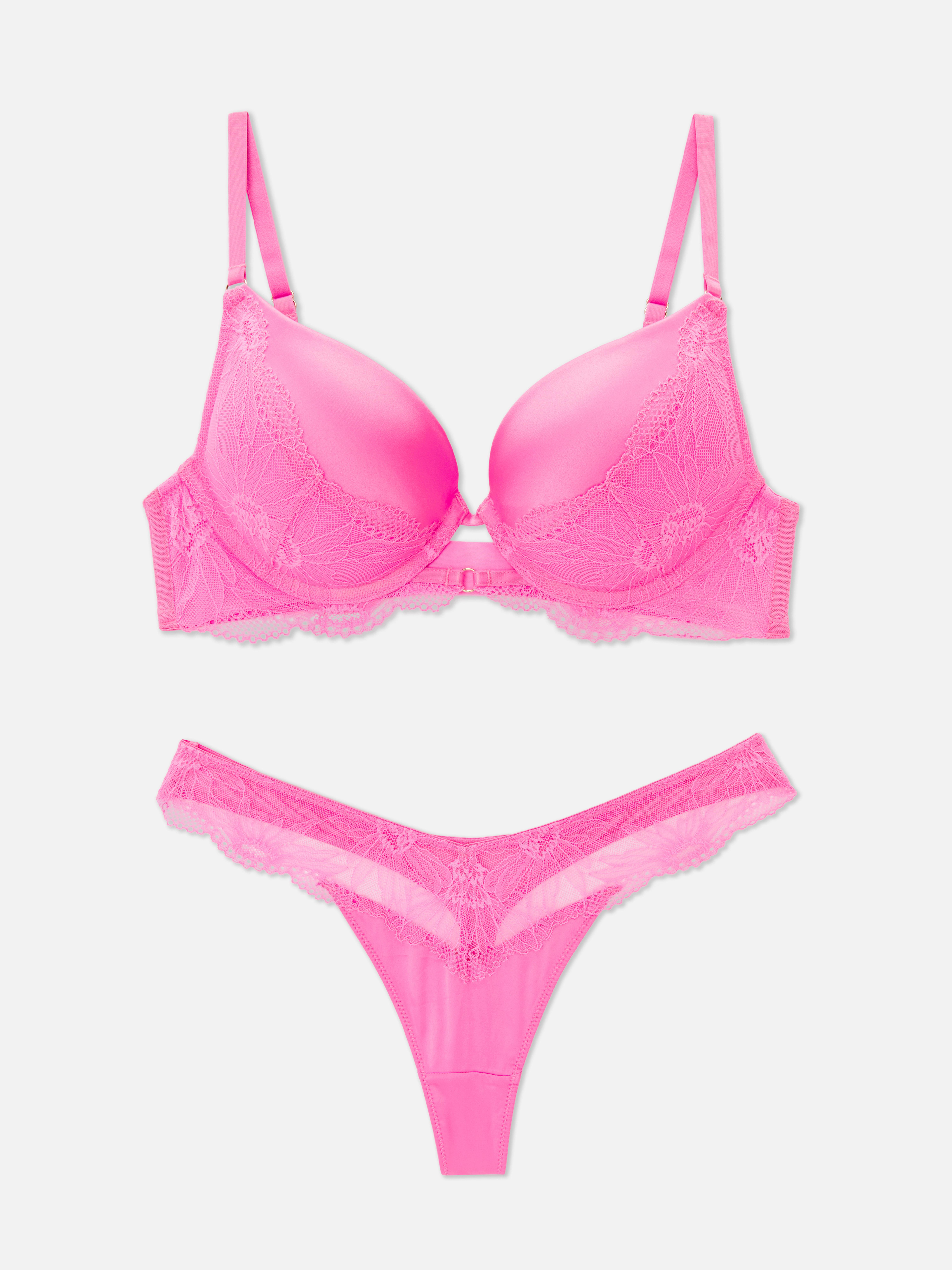 Dessous-Set mit Push-up-BH aus Satin und Spitze. Ein Dessous-Set bestehend aus einem Push-up-BH und passendem String.