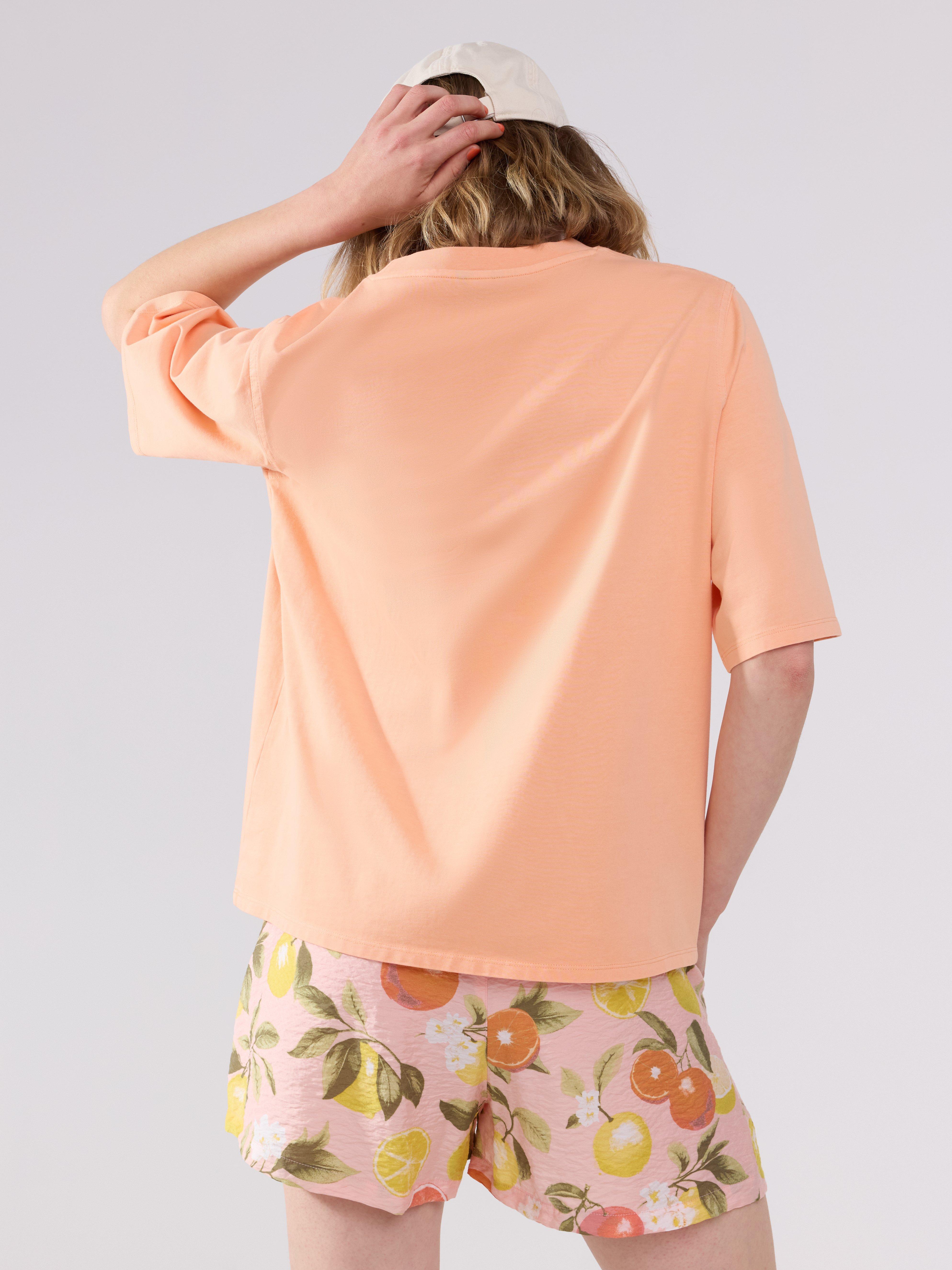 Camiseta oversized coral claro
