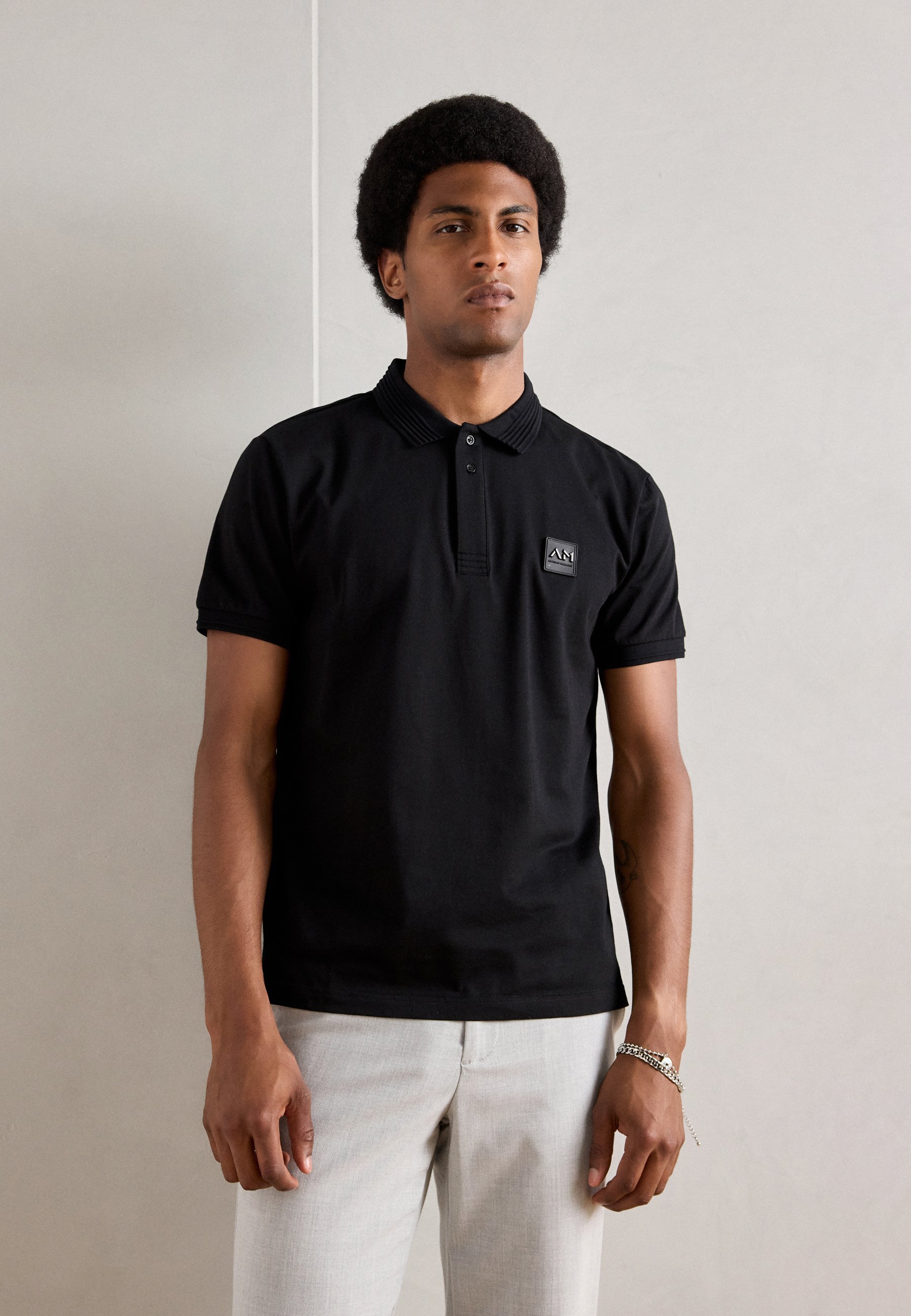 Polo Antony Morato coupe classique avec logo métallique - noir