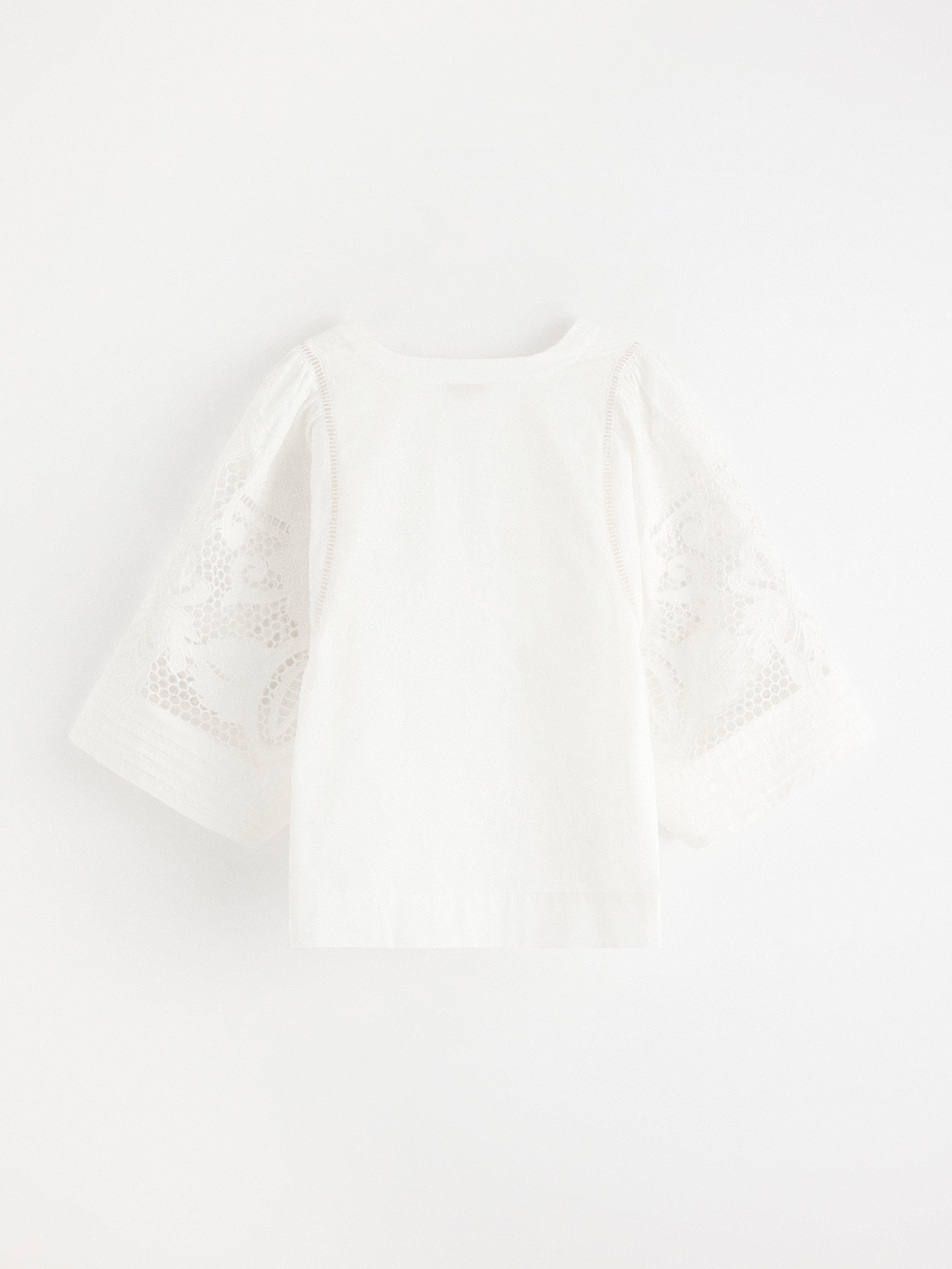Bluse med broderi Hvit