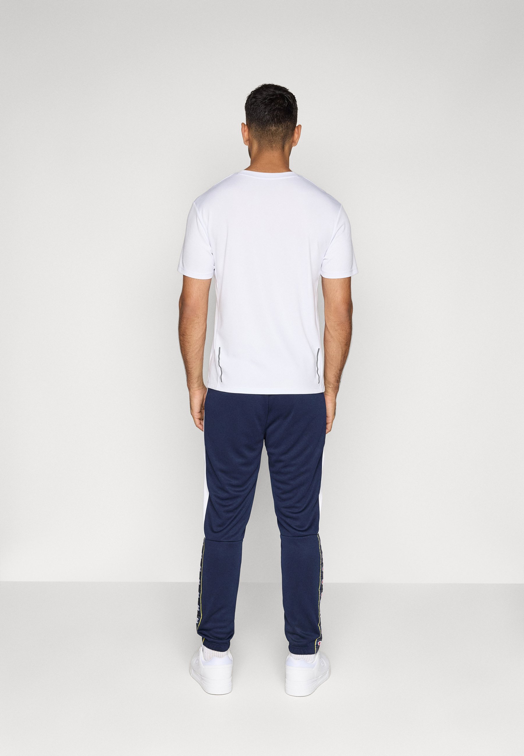 Champion SPORT HERITAGE ELASTIC CUFF PANTS INTERLOCK - Trainingsbroek - donkerblauw