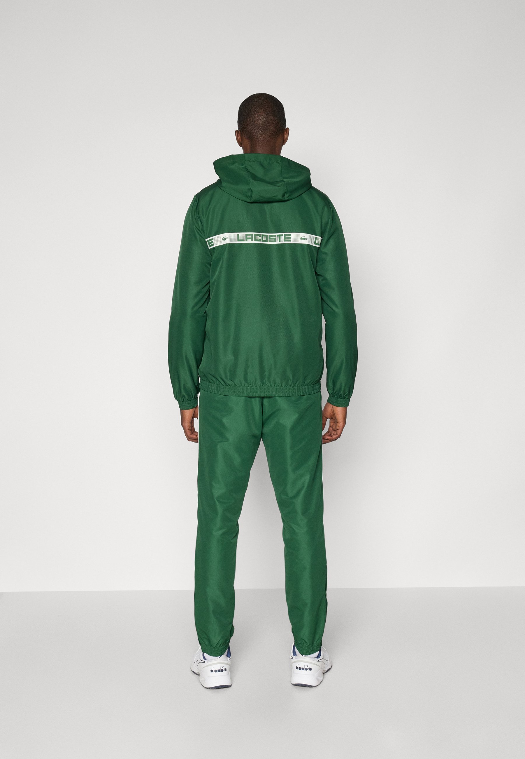 Lacoste Sport TENNIS TRACKSUIT MET CAPUCHON - Trainingspak - groen