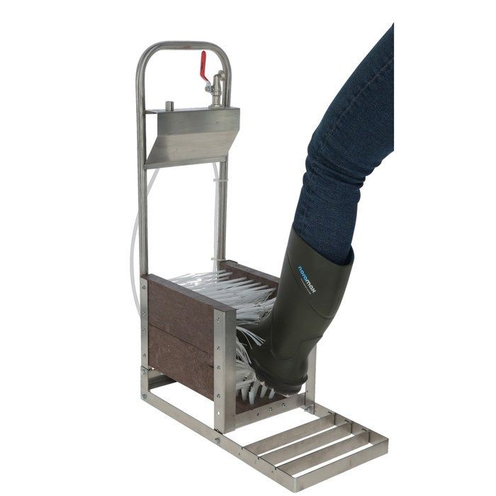 Kit de arandelas para botas desmontado en una caja Kerbl.