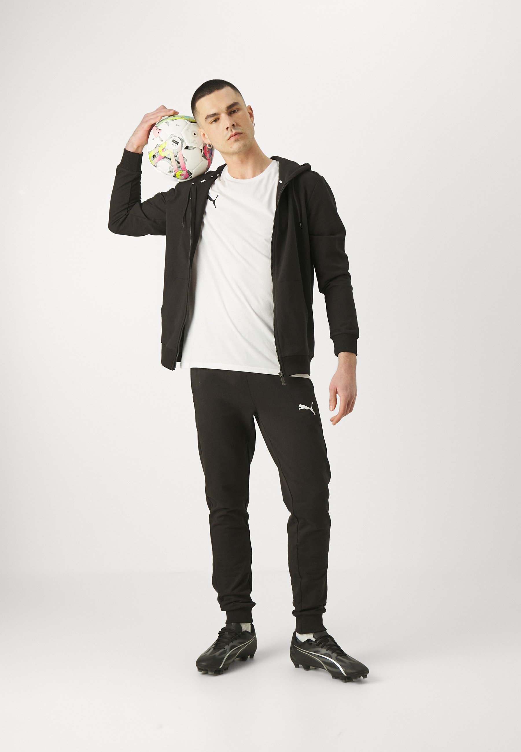 Pantaloni casual Puma TEAMGOAL - Pantaloni da tuta - nero/bianco