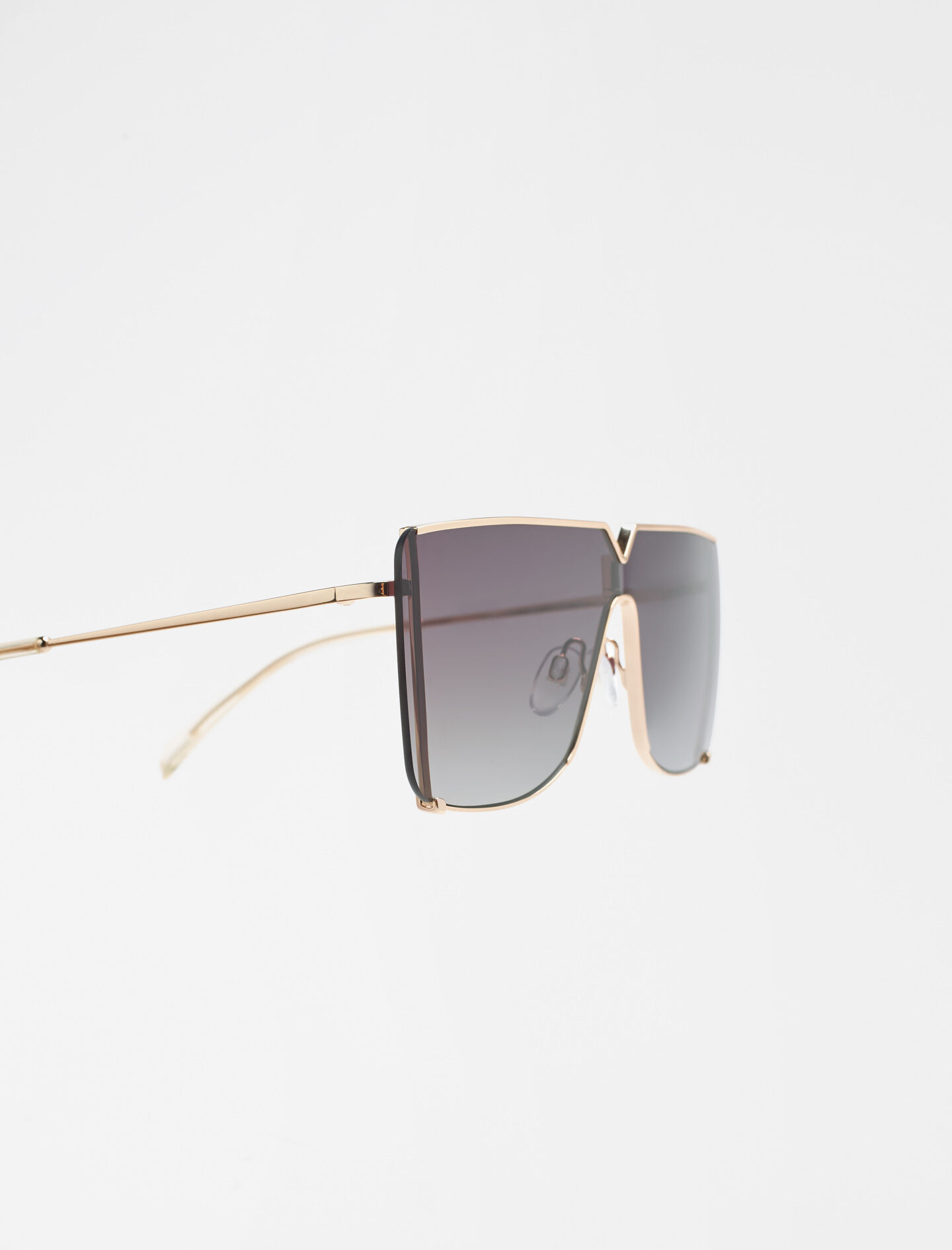 Oversized gouden zonnebril - Kristalgeel