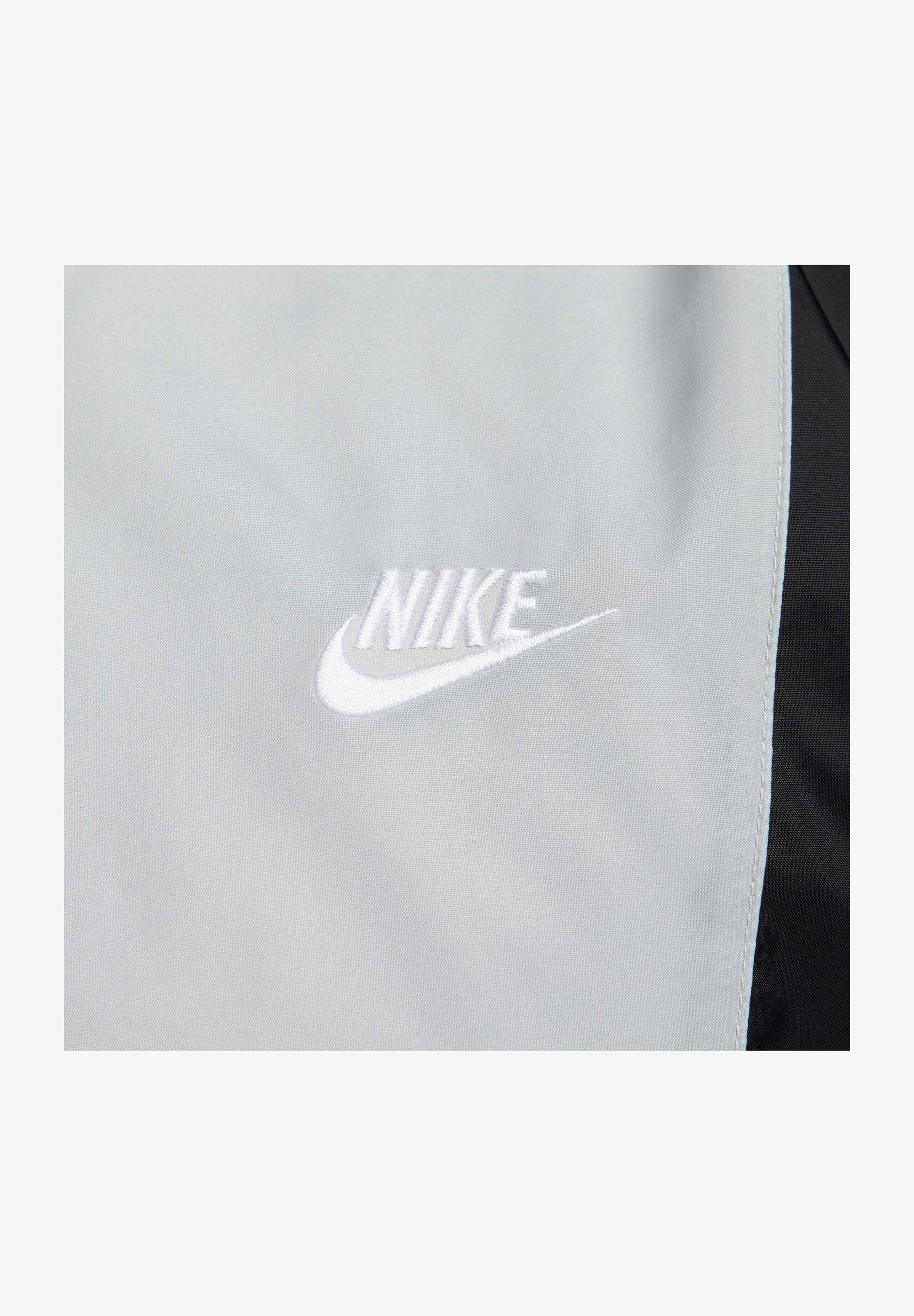 Nike Sportswear Trainingsanzüge