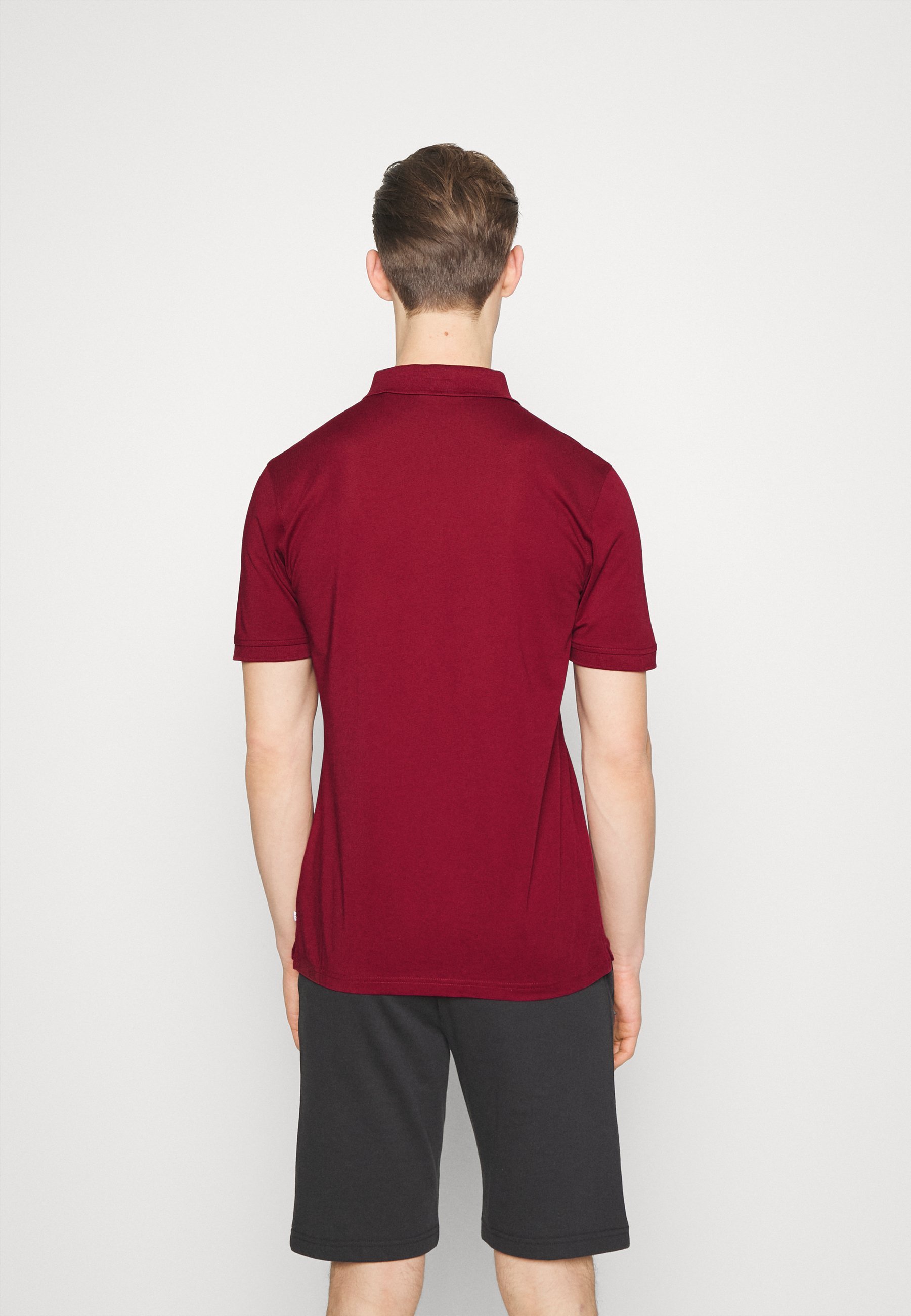 Polo Calvin Klein Golf PLANET - bordeaux