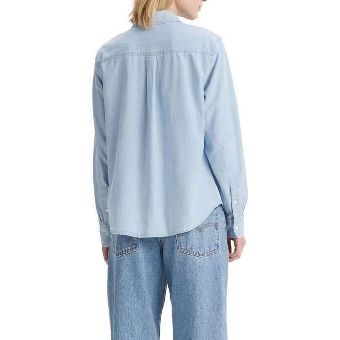 Blusa lisa de mezclilla de algodón azul cielo con corte recto y logo bordado.