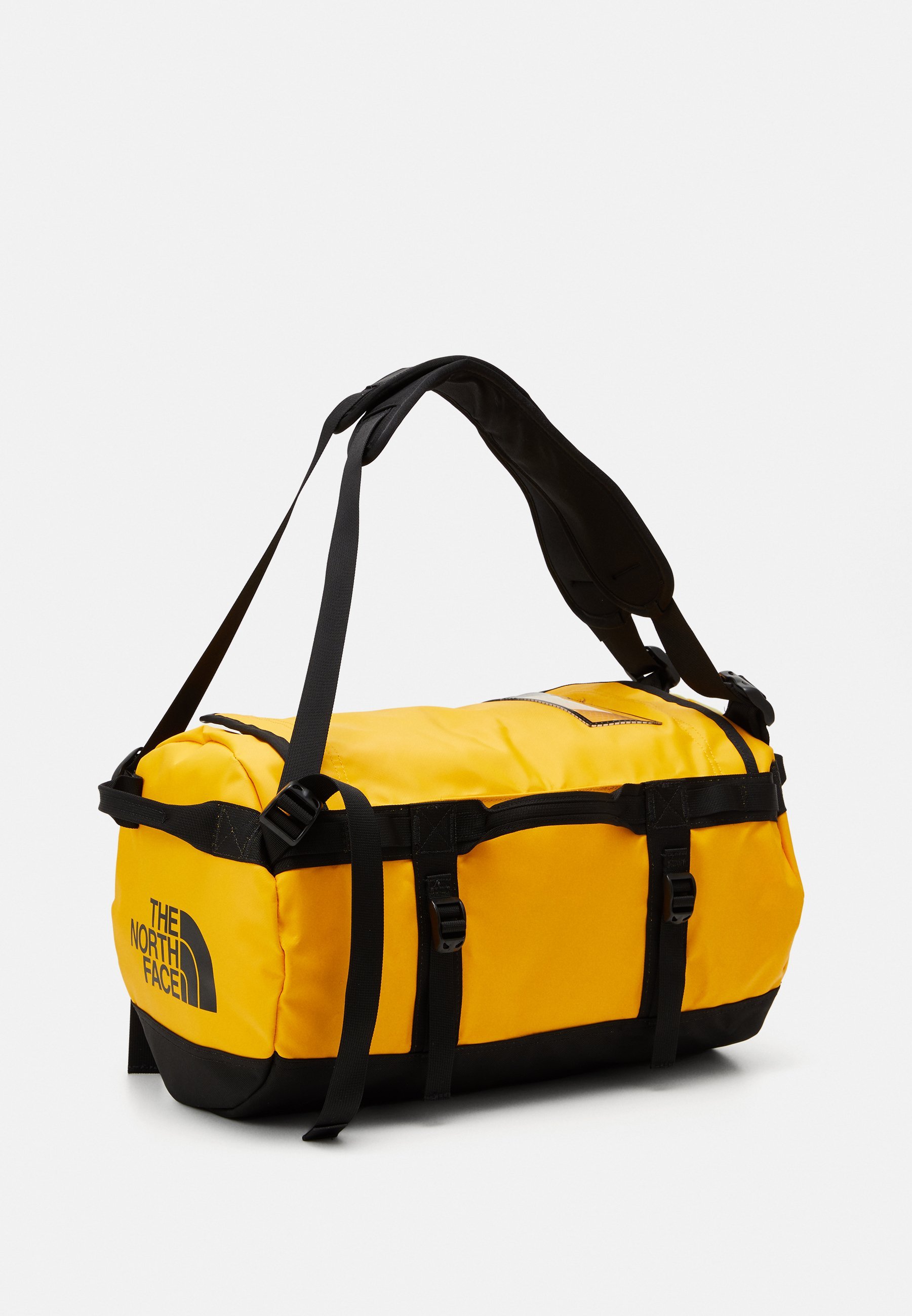 Borsa da viaggio The North Face BASE CAMP DUFFEL - XS - Borsone - oro Summit/nero