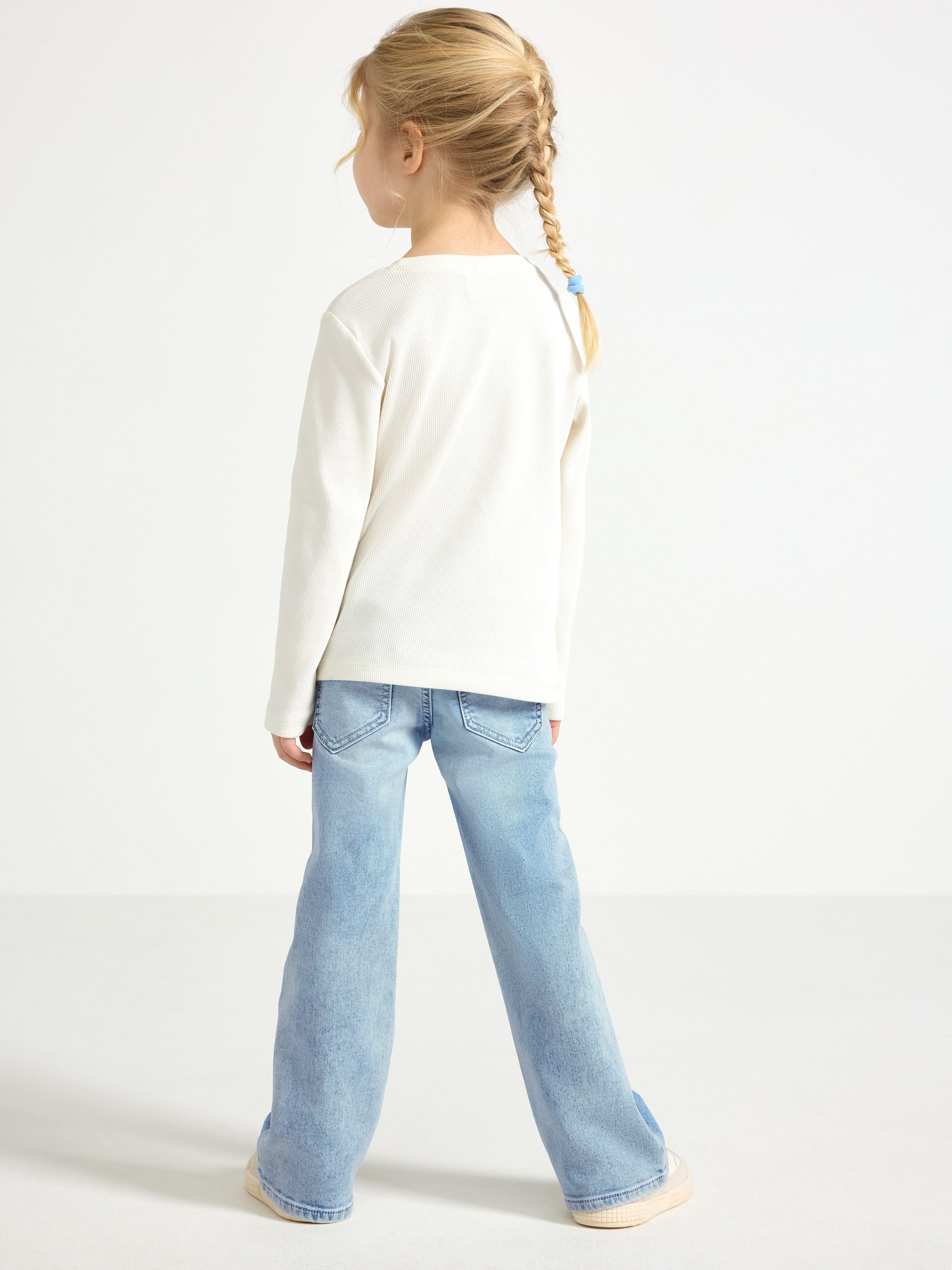 FREJA Jeans acampanados con bordados, mezclilla clara