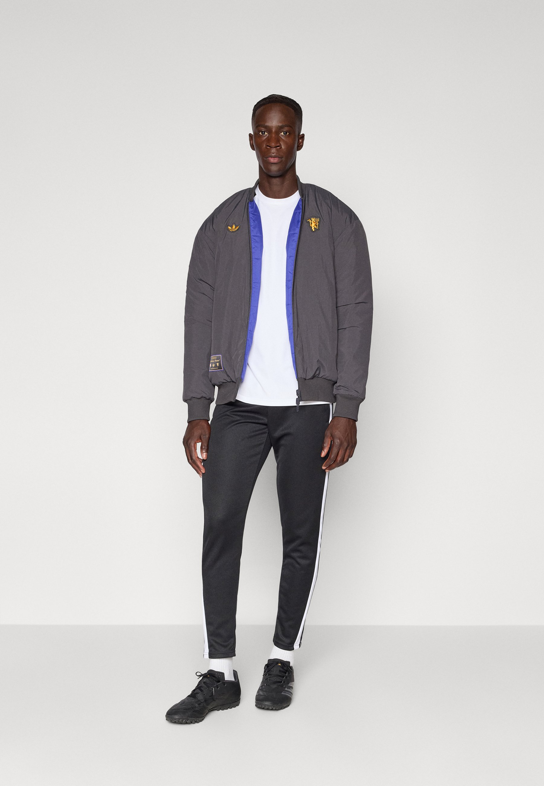 adidas Originals MANCHESTER UNITED ICON JAKNA - Zimska jakna - universal crna/polunoćna bljeskalica
