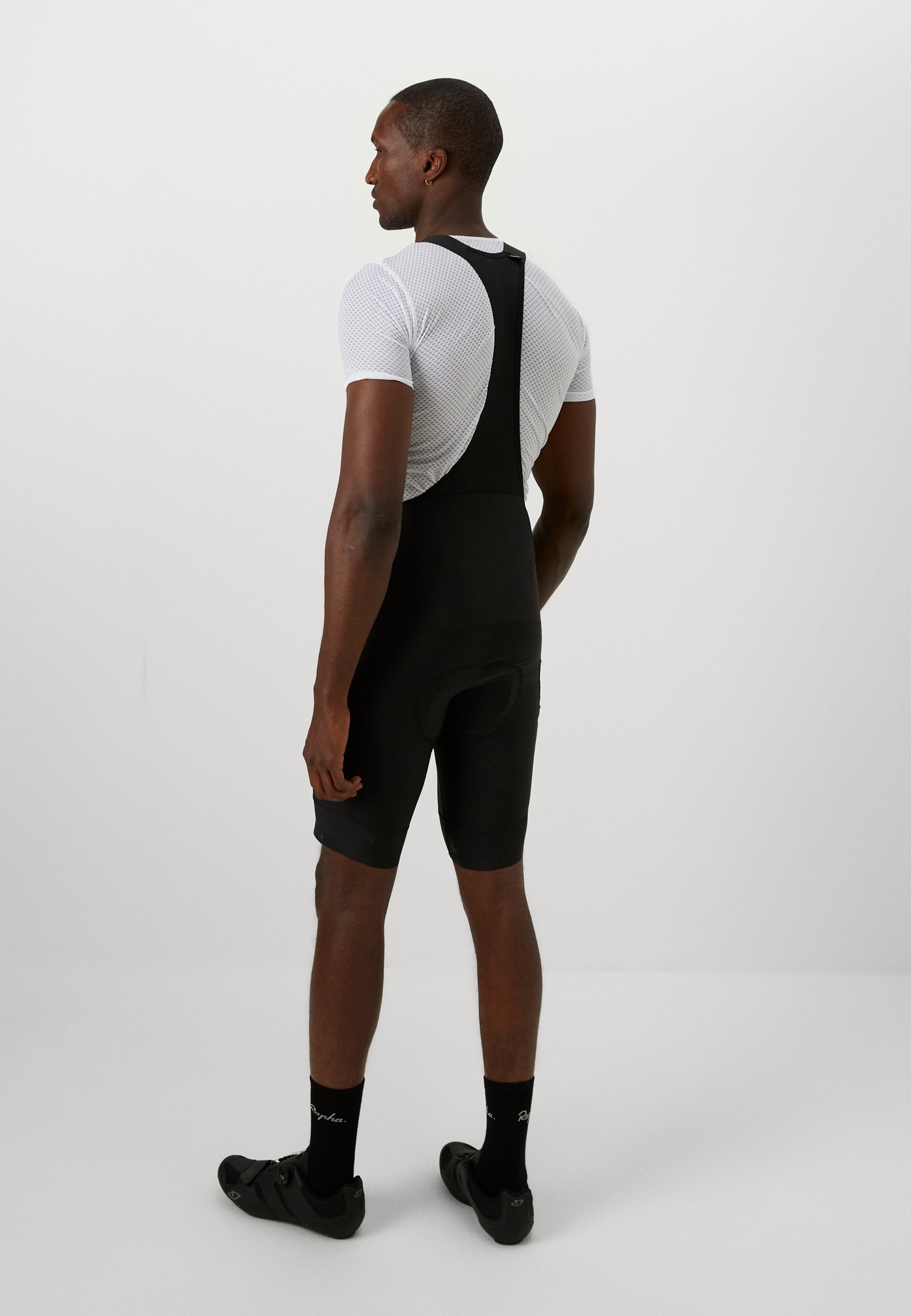 Pantaloncini con bretelle da uomo Rapha - neri