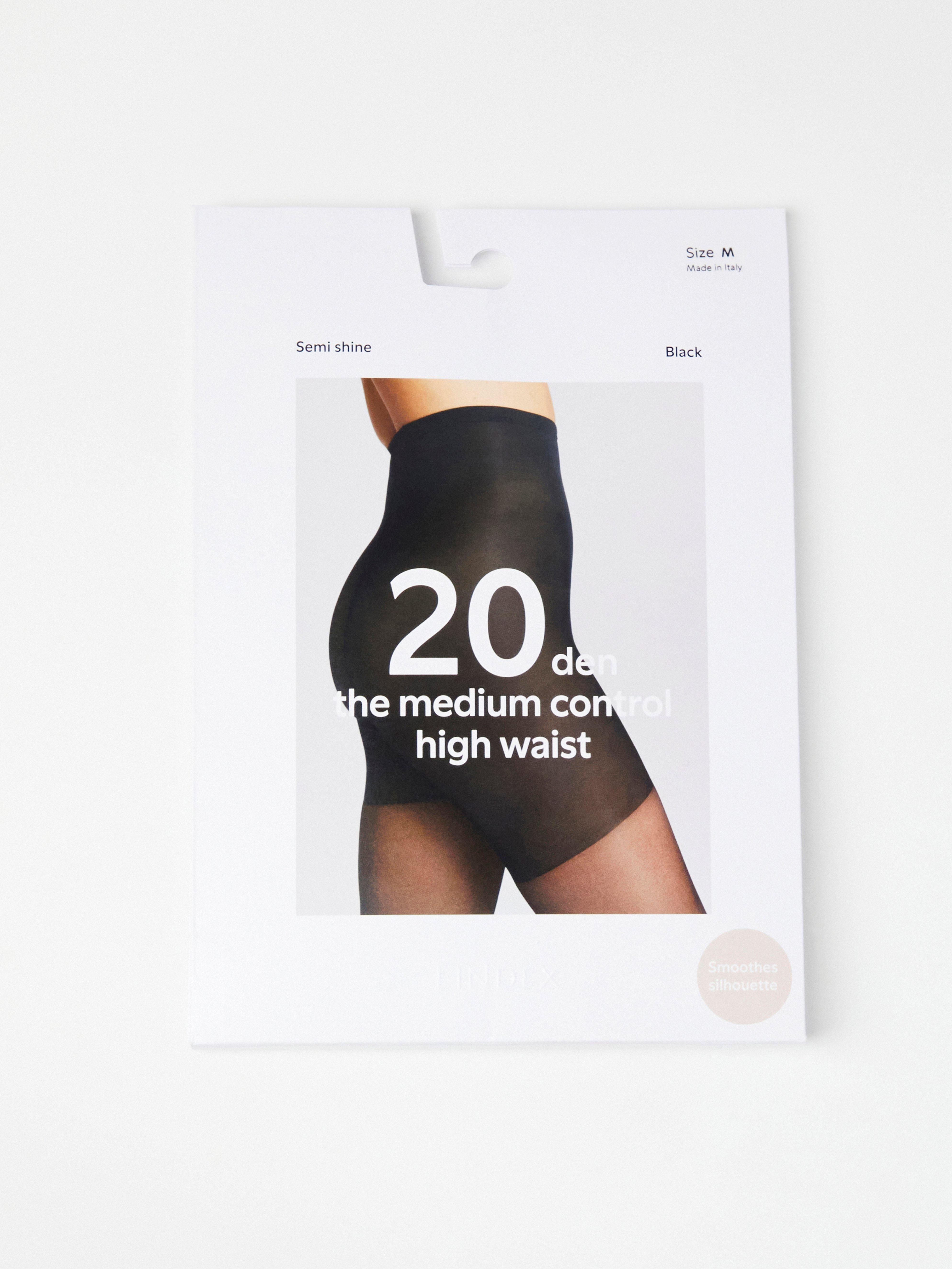 Medias semibrillantes de talle alto, 20 deniers, color negro.