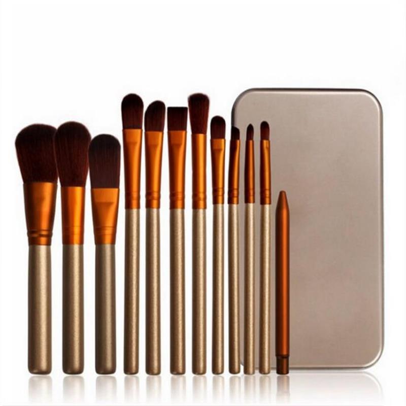 Conjunto de 12 pincéis de maquiagem profissionais Naked3, incluindo pincéis para sombra, na cor dourada, com estojo de metal.