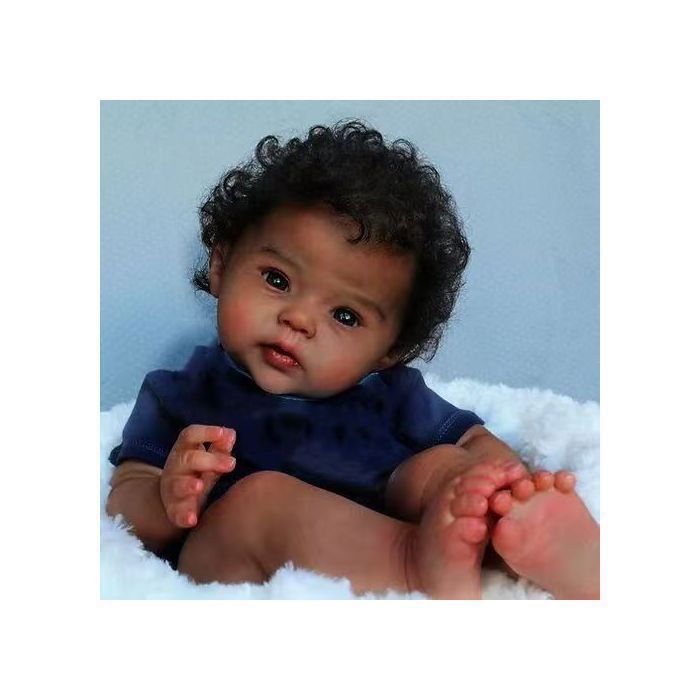 Muñeca Reborn - Cuervo - Piel morena - Cabello rizado - 50 cm - Cuerpo suave - Regalo ideal para Navidad y cumpleaños