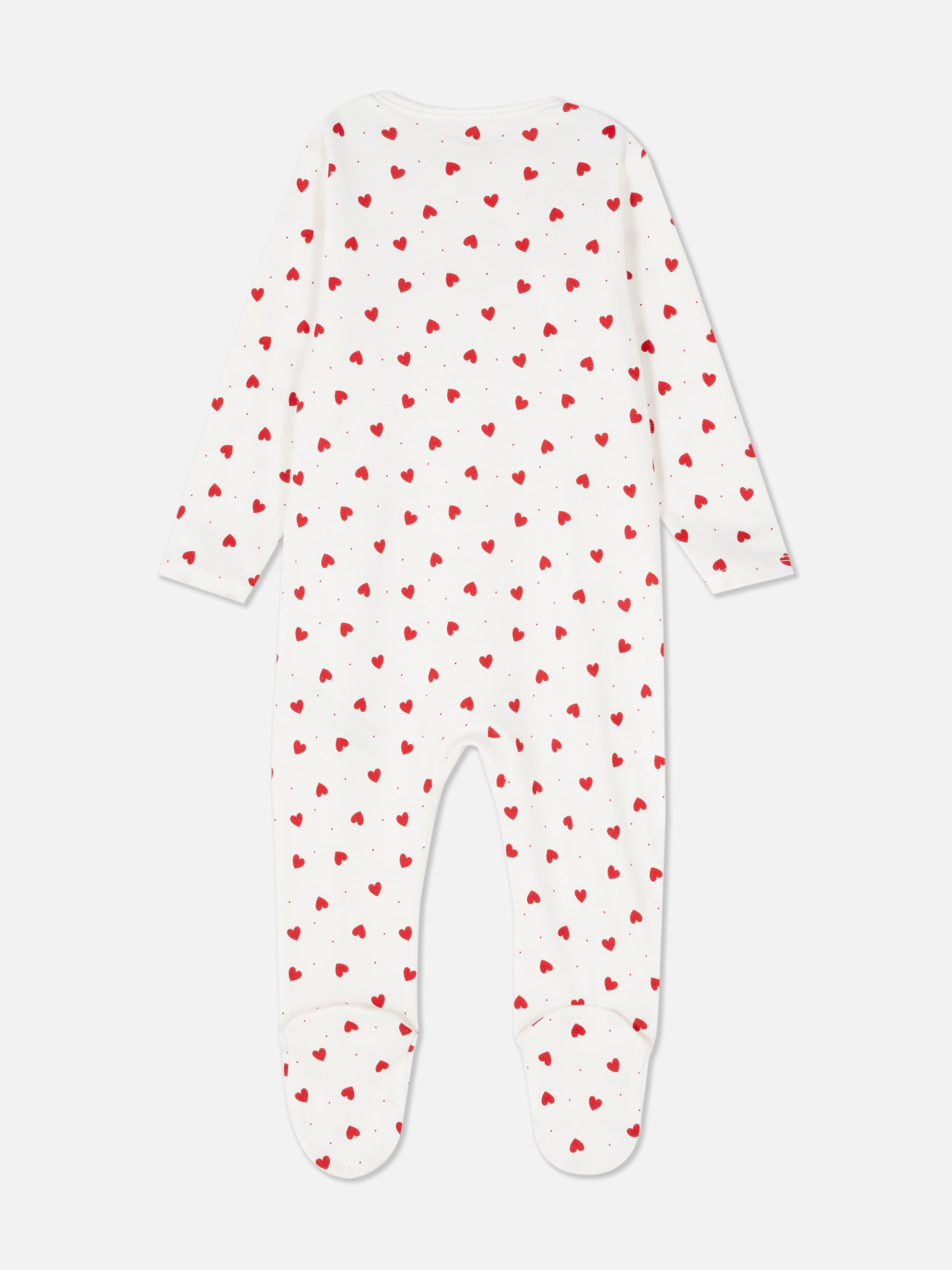 Pijama înfășurată cu inimioare. Un pijama cu model înfășurat, mâneci lungi și model cu picioare.