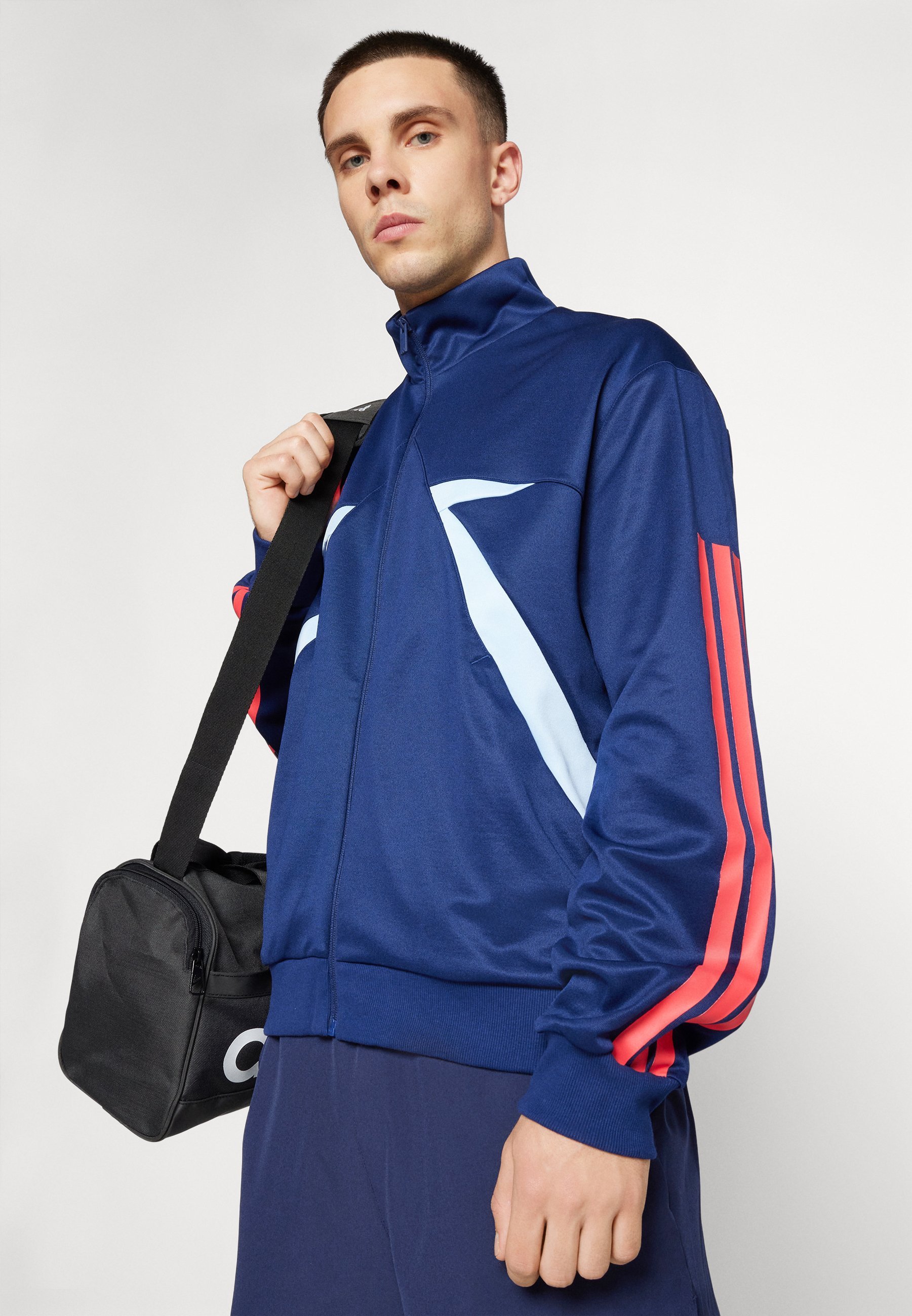 adidas Sportswear TIRO - Giacca da allenamento - blu scuro/blu fluorescente/rosso semilucido