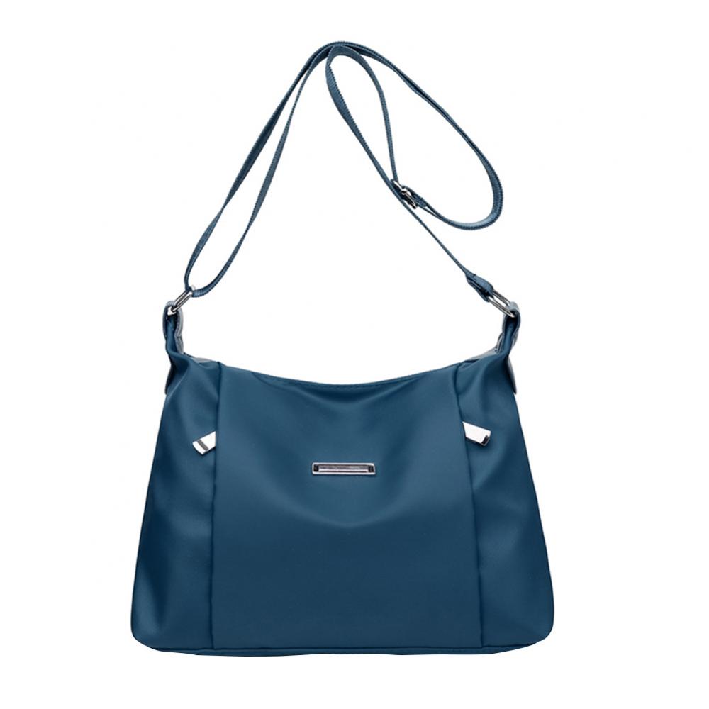 Sac bandoulière femme en nylon décontracté, grande capacité, avec pochette pour téléphone, couleur unie.