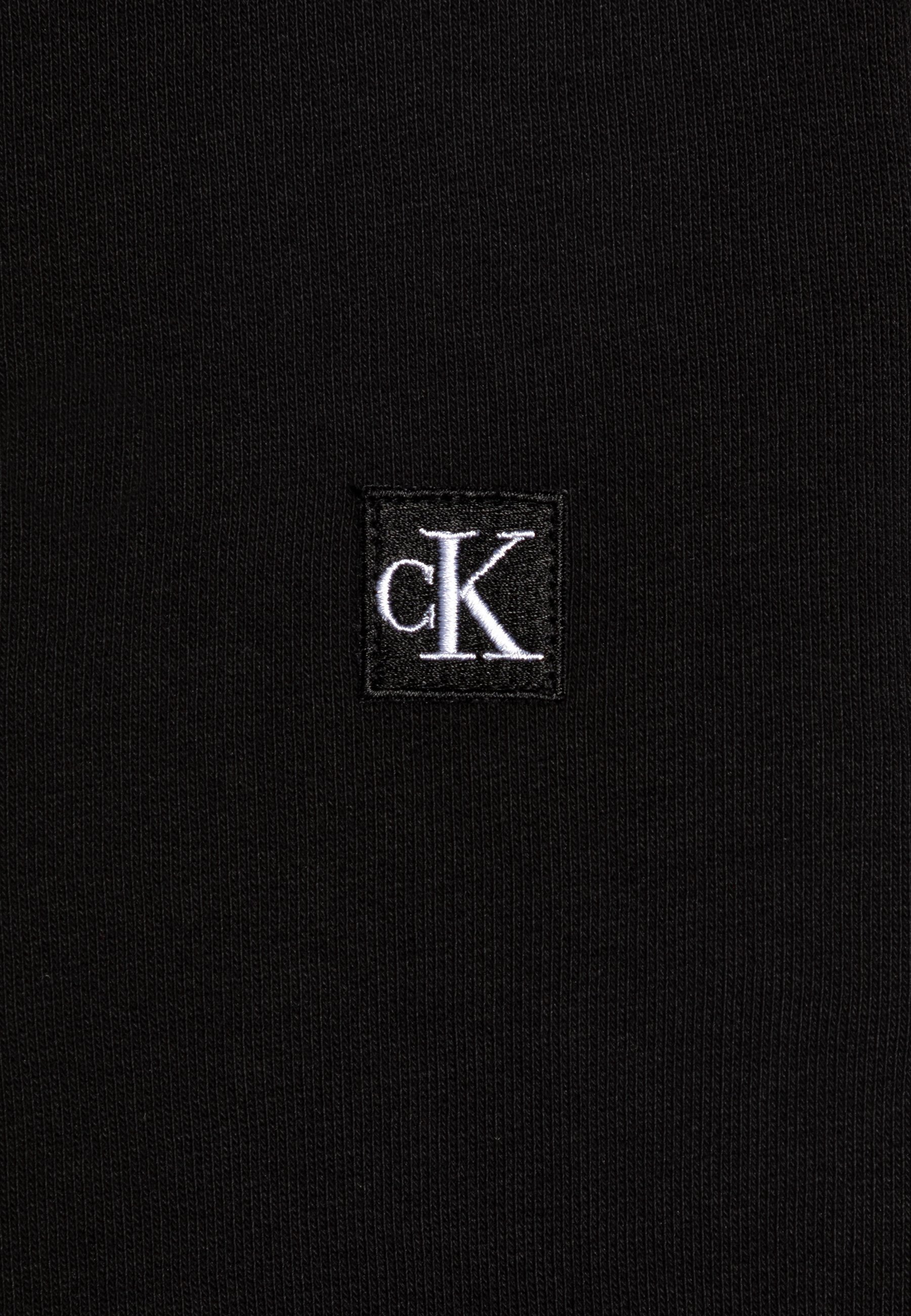 Sweat-shirt unisexe Calvin Klein Jeans MONO MINI BADGE noir