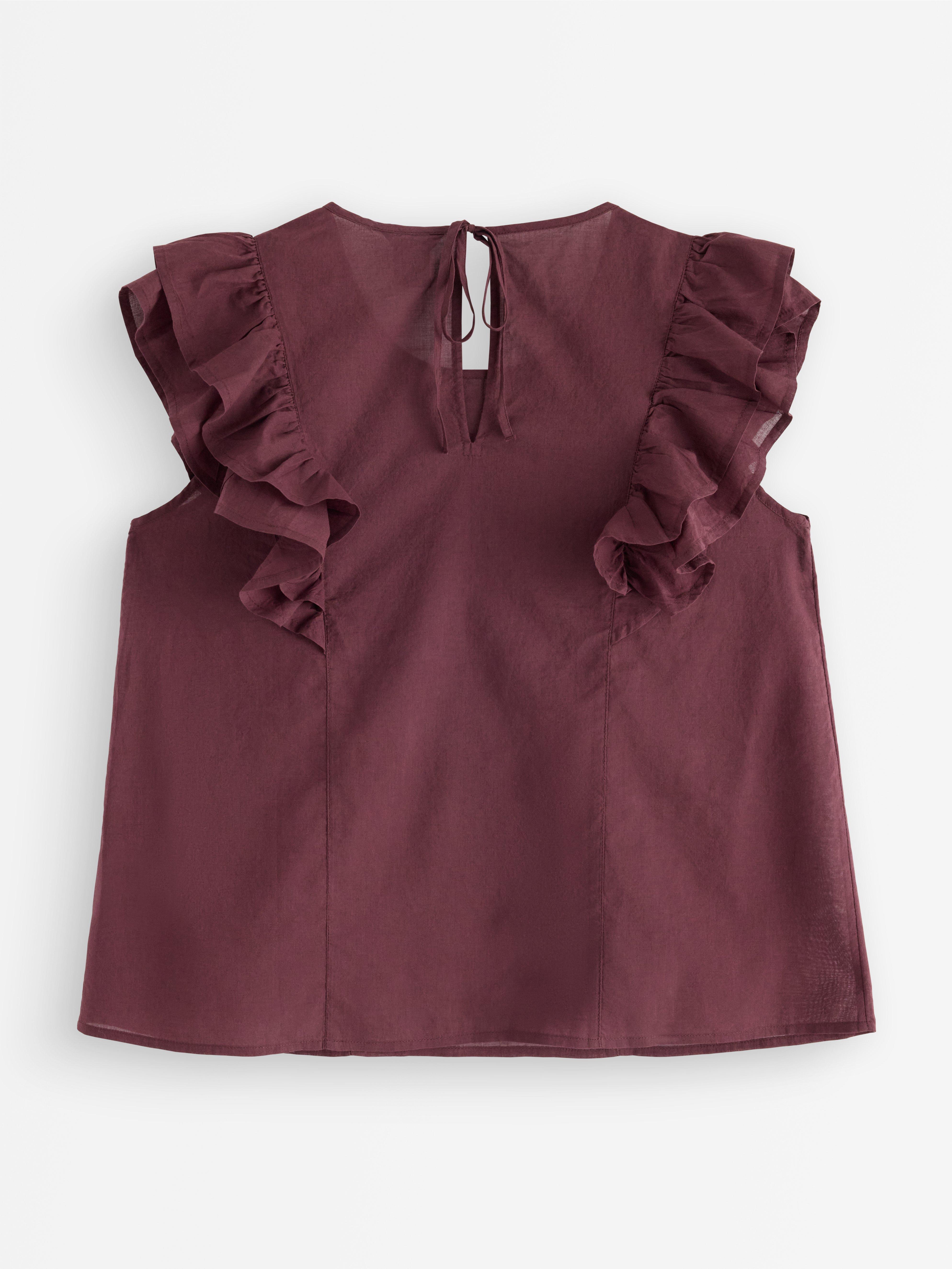 Blusa sin mangas rojo oscuro