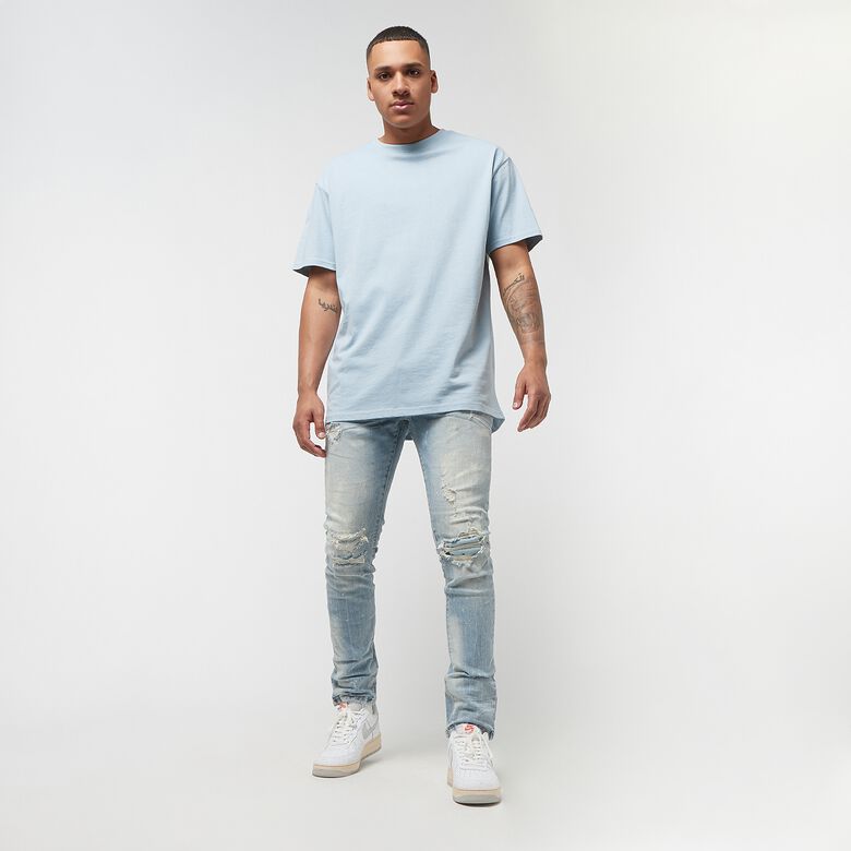 Gebleekt, gewassen, gescheurde en gerepareerde jeans